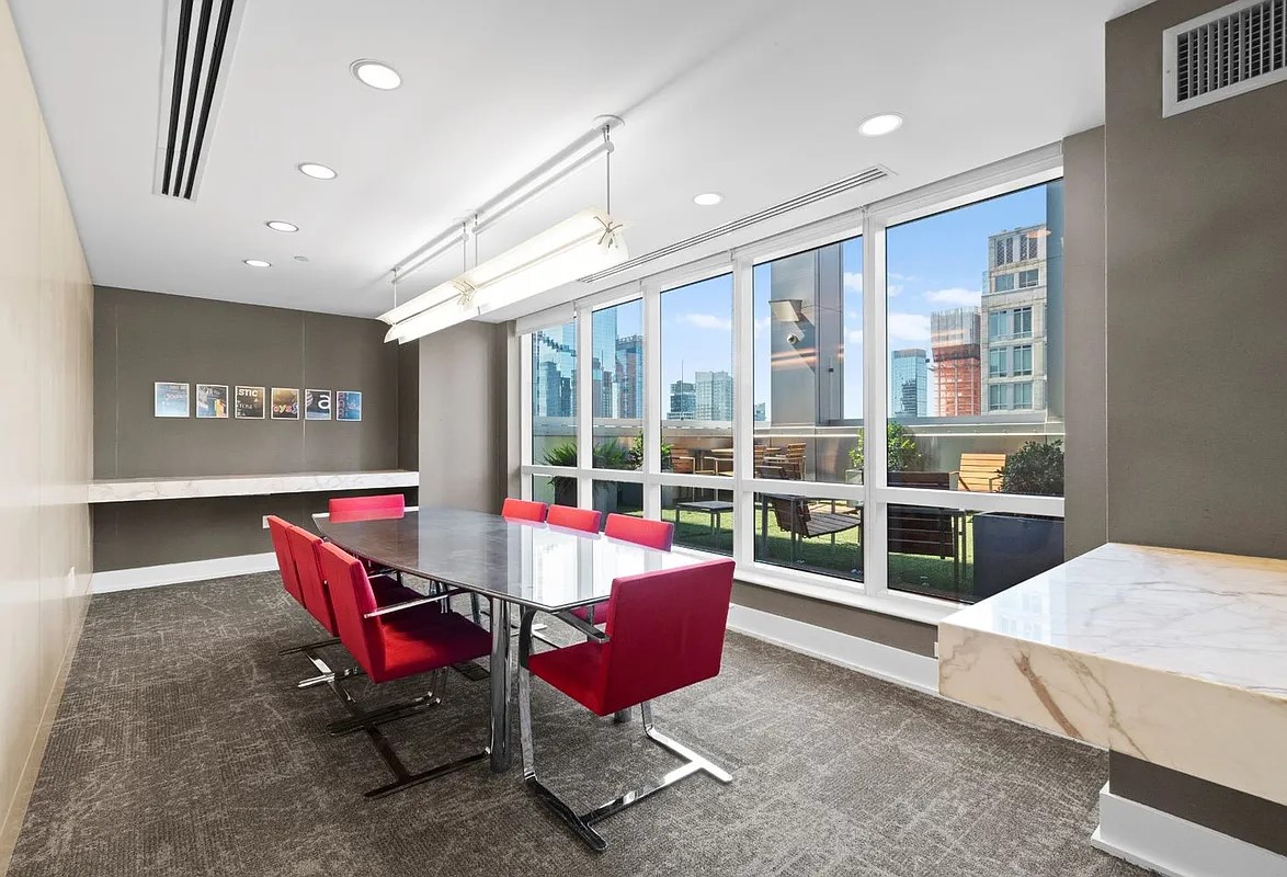 350 West 42nd Street, Unit 12C Manhattan, NY 10036 - Photo 17 of 21 a living room with furniture