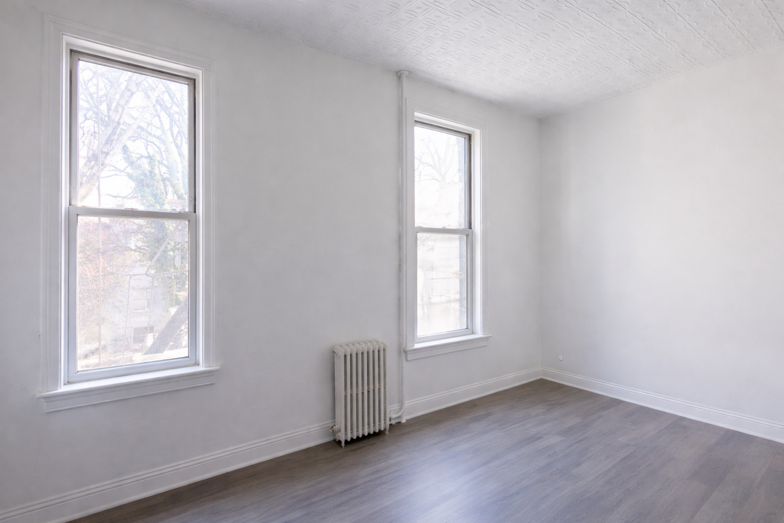 40 A Jewel Street, Unit 2 Brooklyn, NY 11222 - Photo 6 of 10 an empty room with wooden floor and windows