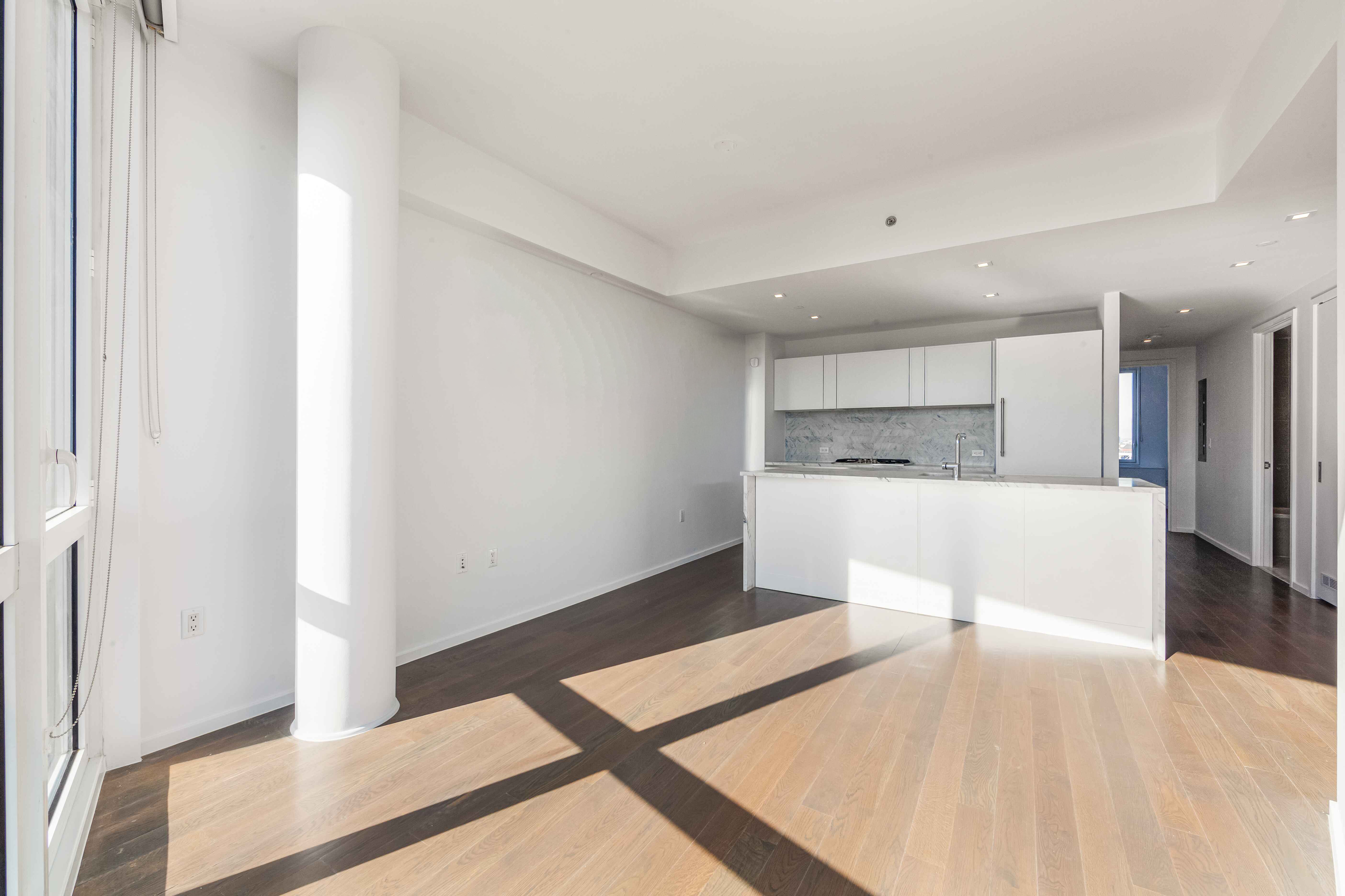 202 8th Street, Unit 9B Brooklyn, NY 11215 - Photo 7 of 21 a view of a kitchen with wooden floor