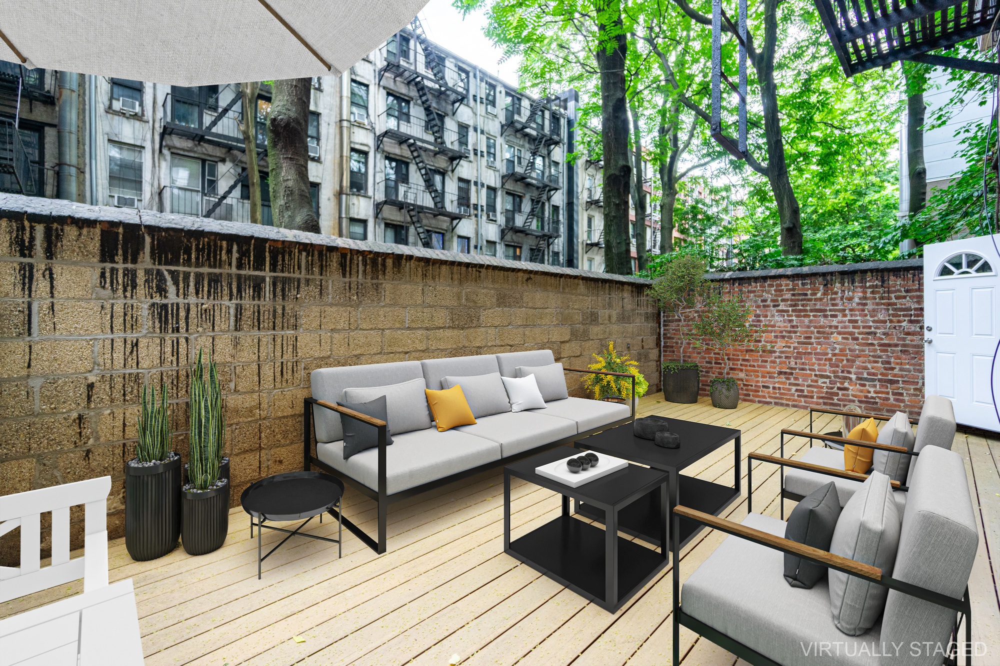 315 East 5th Street, Unit 1C Manhattan, NY 10003 - Photo 3 of 15 a view of a roof deck with couches