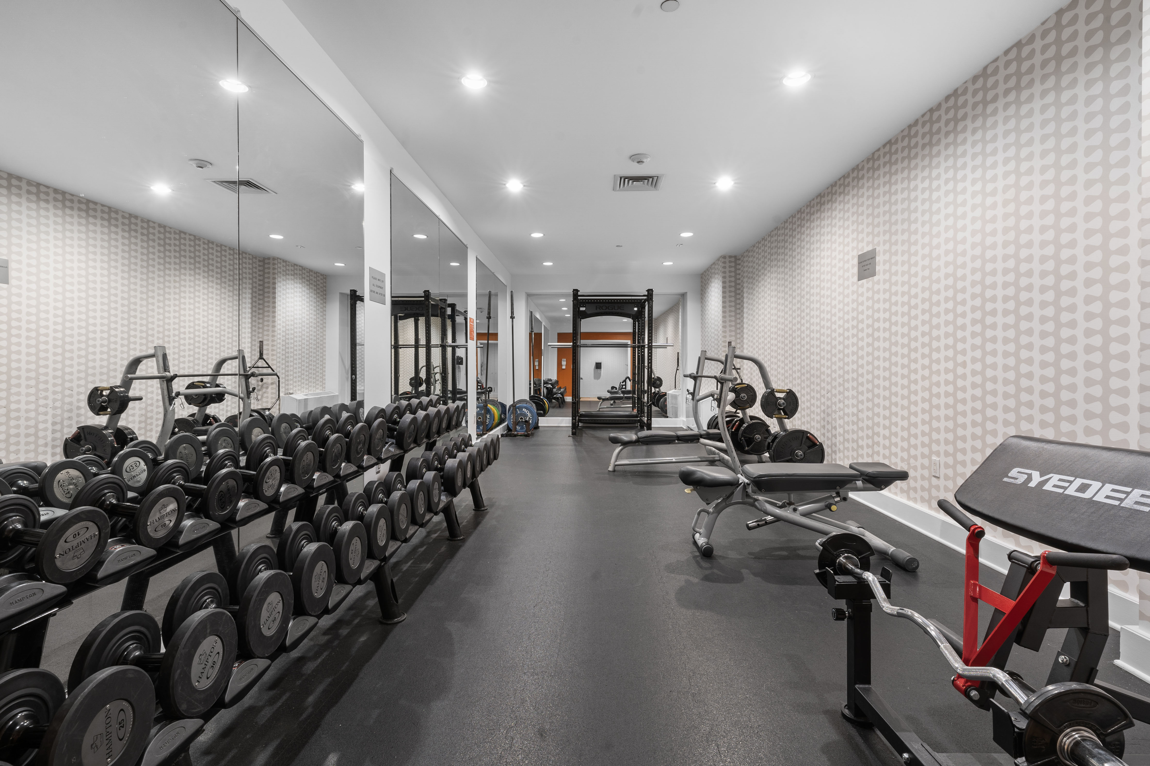 360 Furman Street, Unit 1041/1042 Brooklyn, NY 11201 - Photo 22 of 30 a view of a room with gym equipment