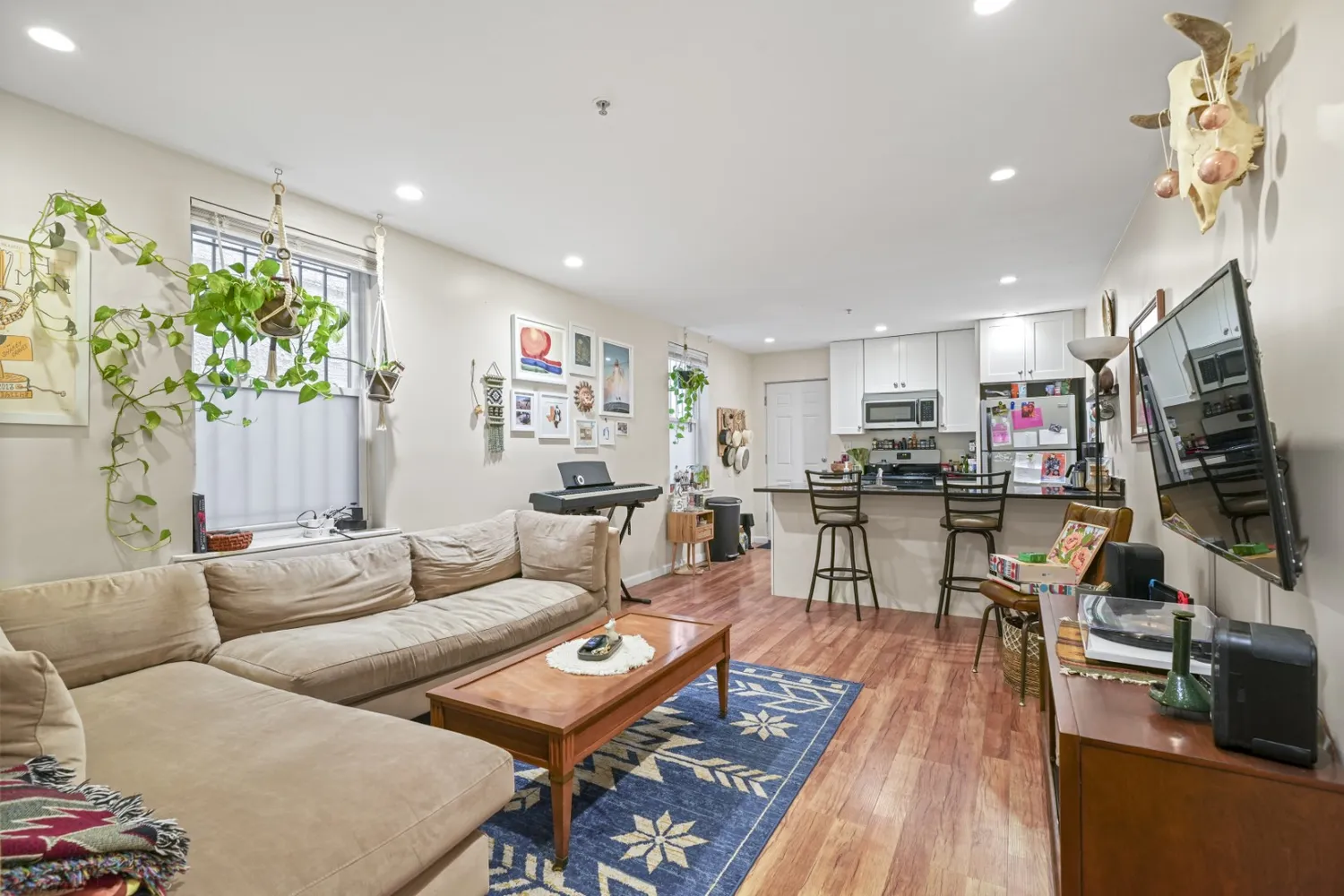 a kitchen with a sink stove and microwave
