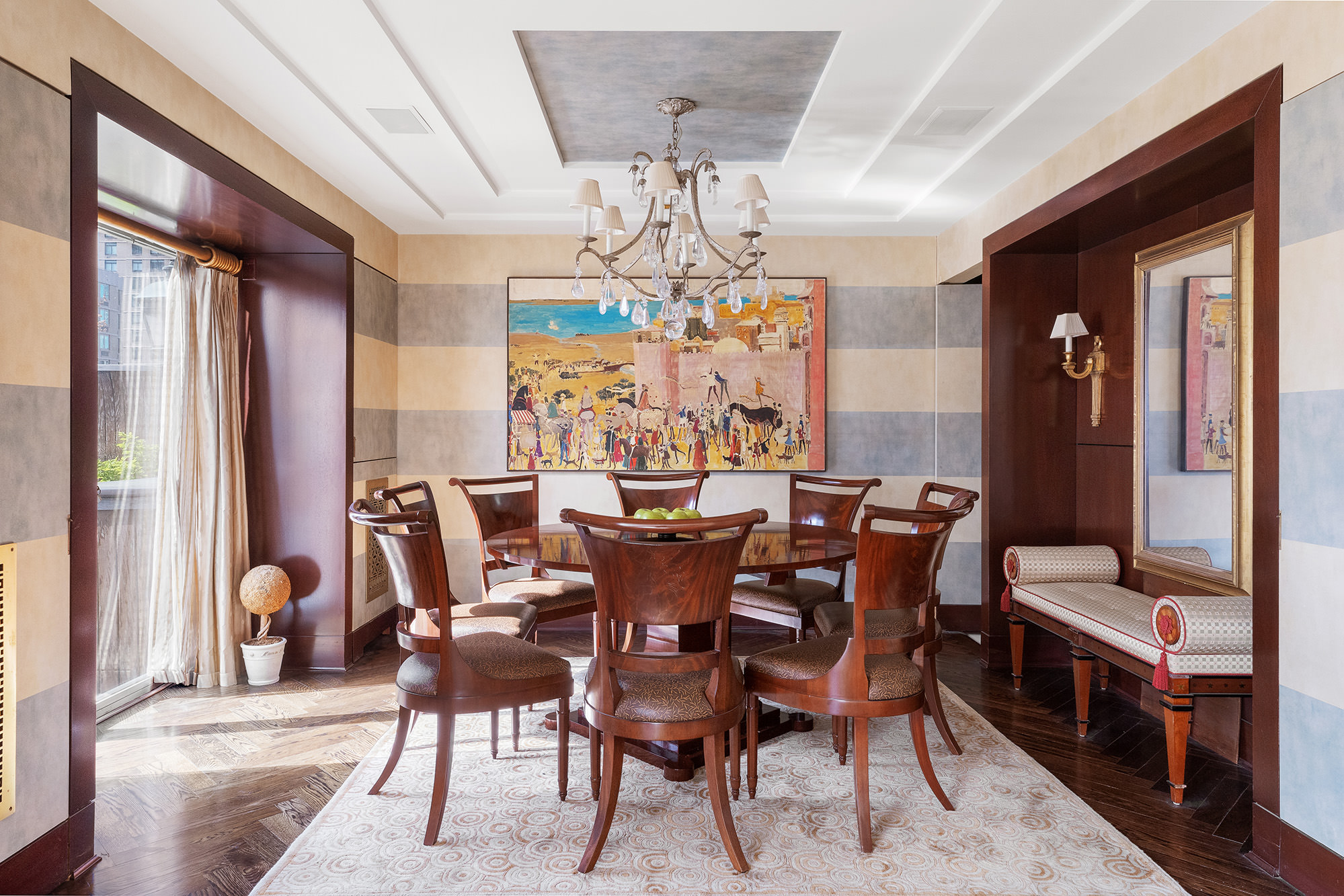 360 East 72nd Street, Unit C1801 Manhattan, NY 10021 - Photo 5 of 20 a view of a dining room with furniture a chandelier and large windows