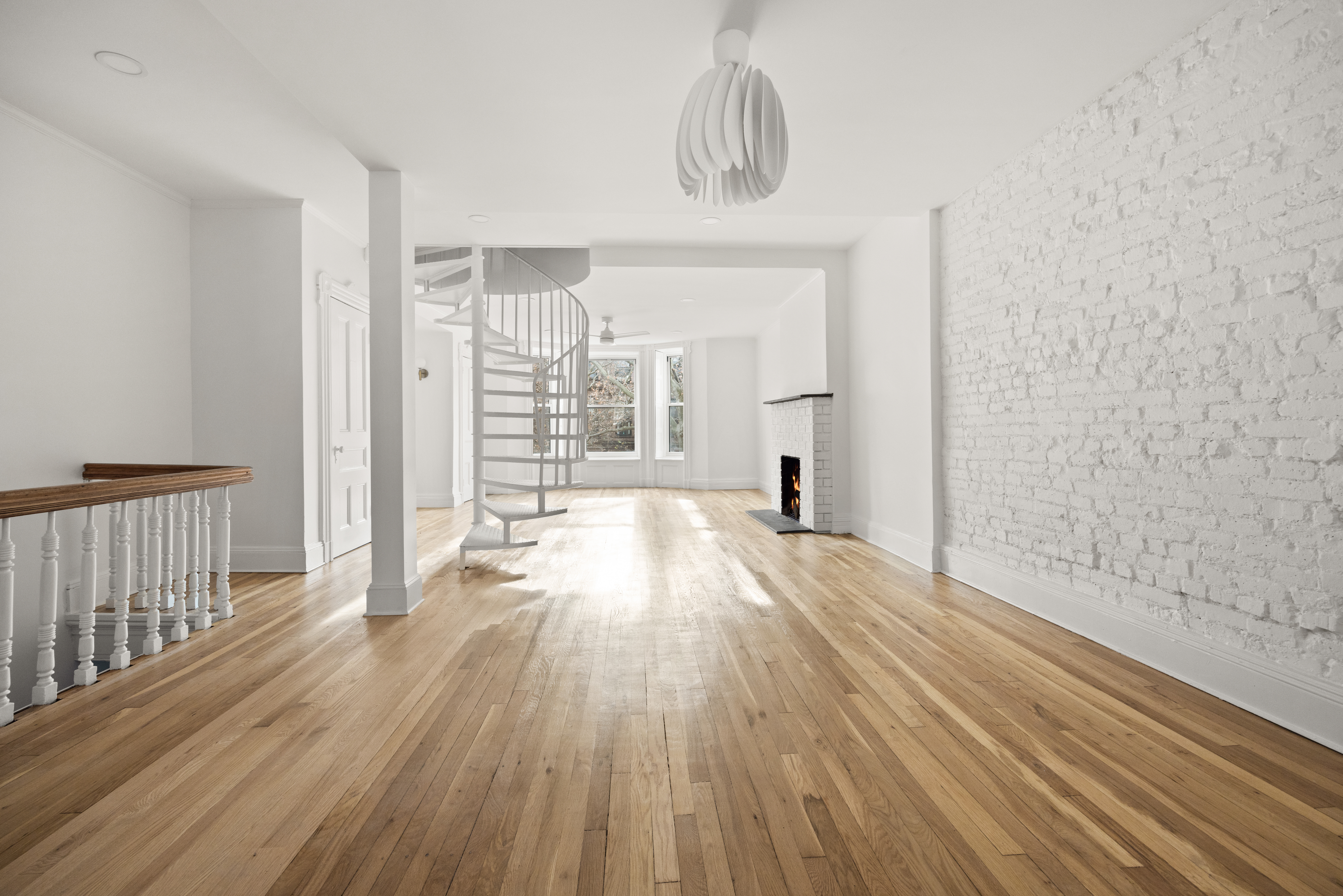 485 1st Street, Unit 2 Brooklyn, NY 11215 - Photo 4 of 17 a view of a room with wooden floor and iron gate