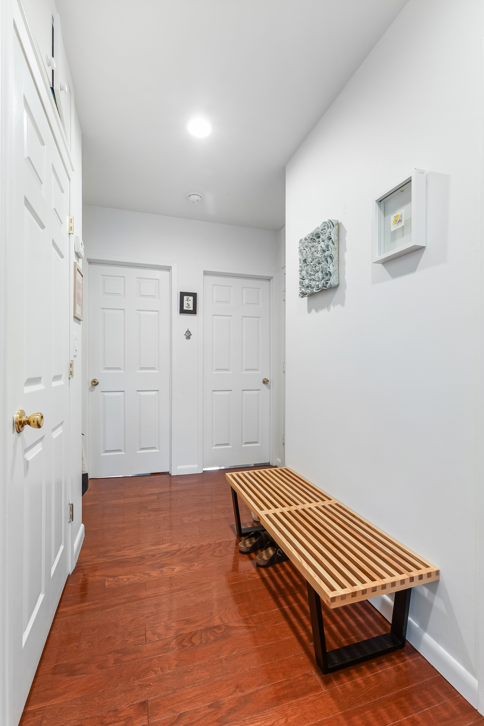 185 Smith Street Brooklyn, NY 11201 - Photo 13 of 14 a bedroom with a bed and wooden floor