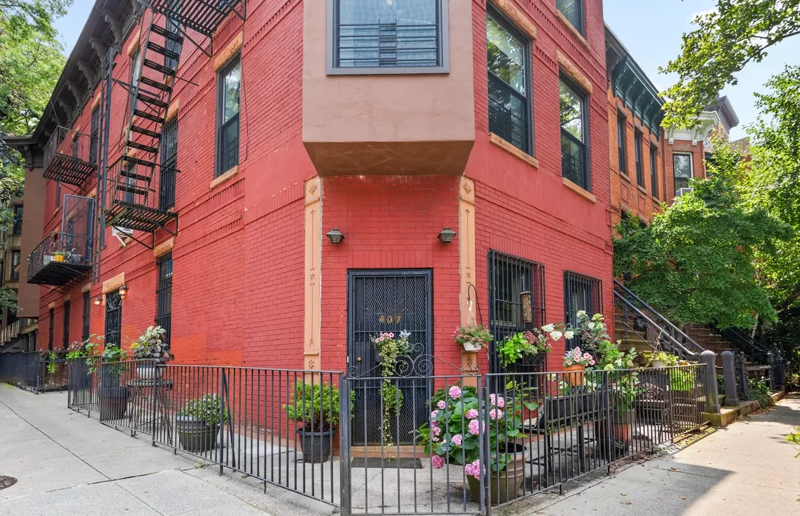 front view of a house with a small yard