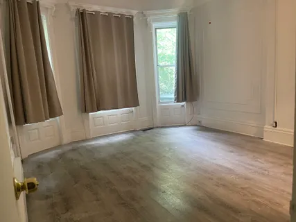 an empty room with windows