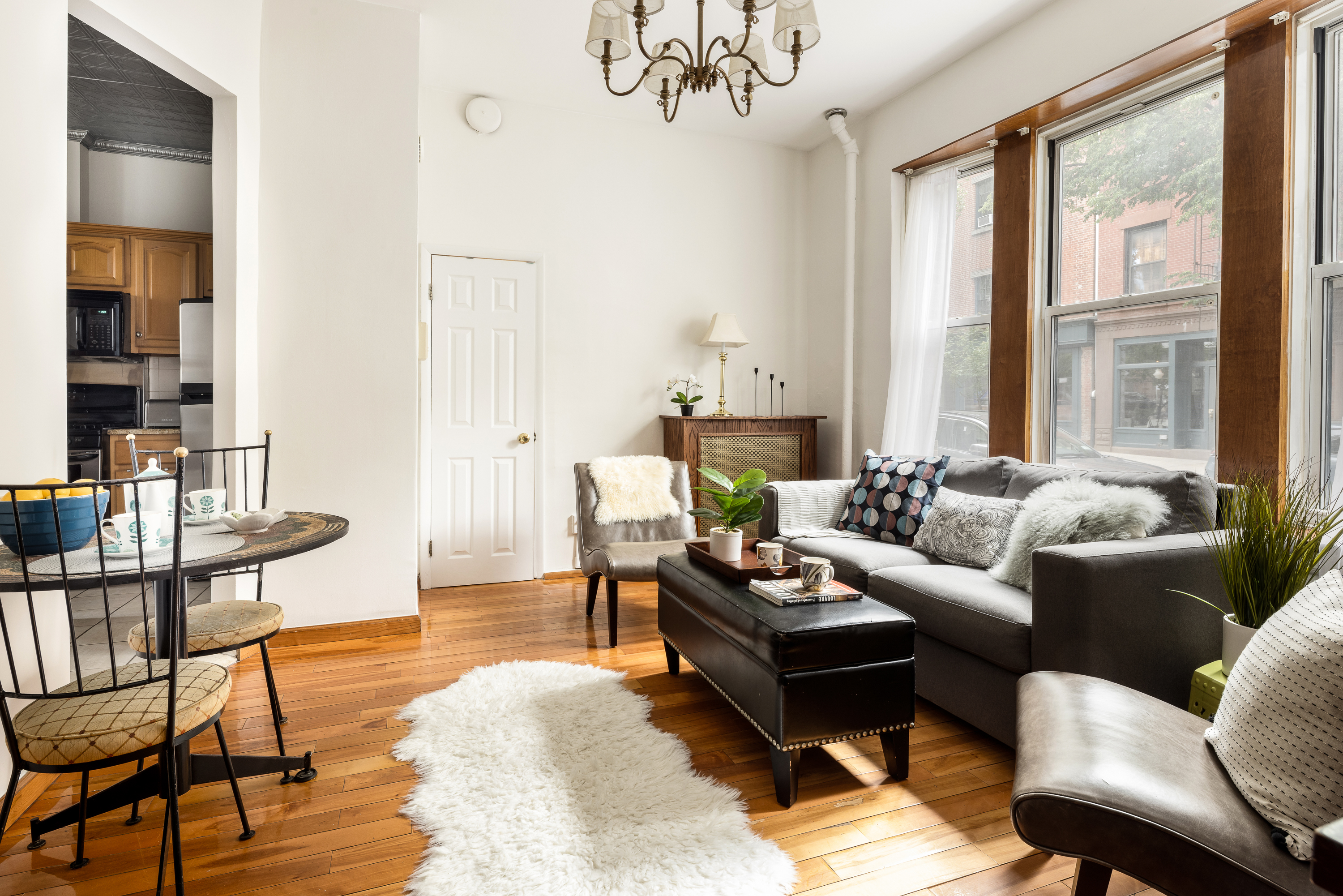 55 Hicks Street, Unit 2 Brooklyn, NY 11201 - Photo 2 of 8 a living room with furniture and a large window