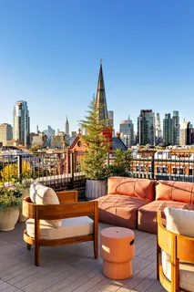 a view of a terrace with chairs