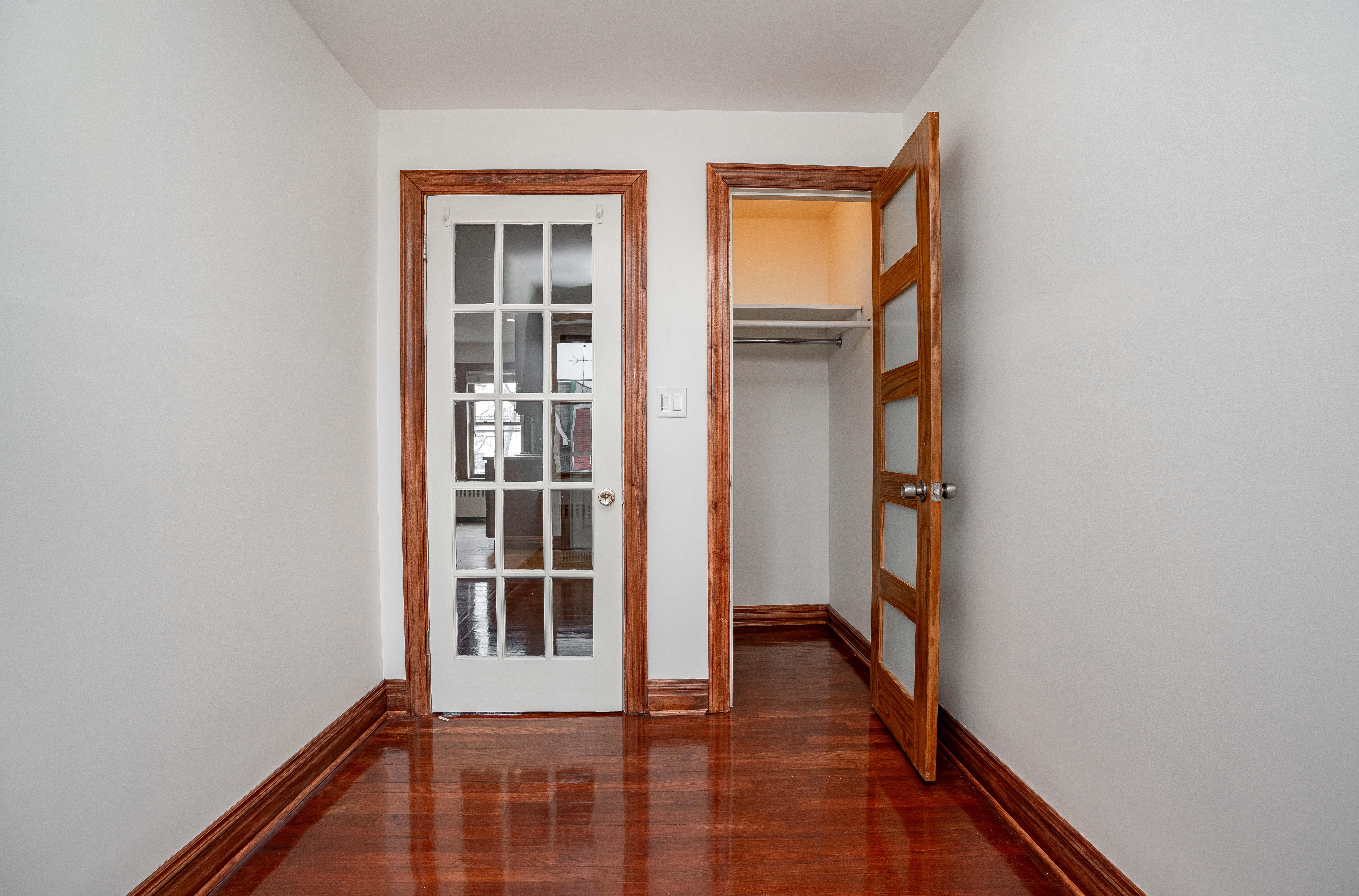 20-60 33rd Street, Unit 2 Queens, NY 11105 - Photo 10 of 10 a view of hallway with wooden floor and stairs