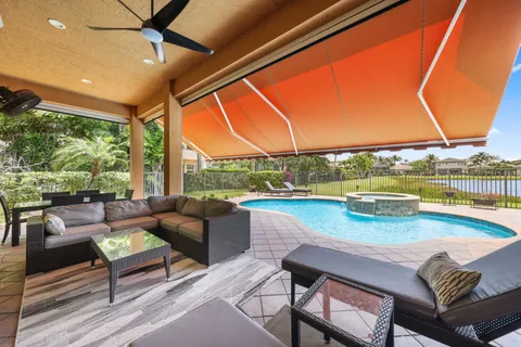 a view of a patio with swimming pool