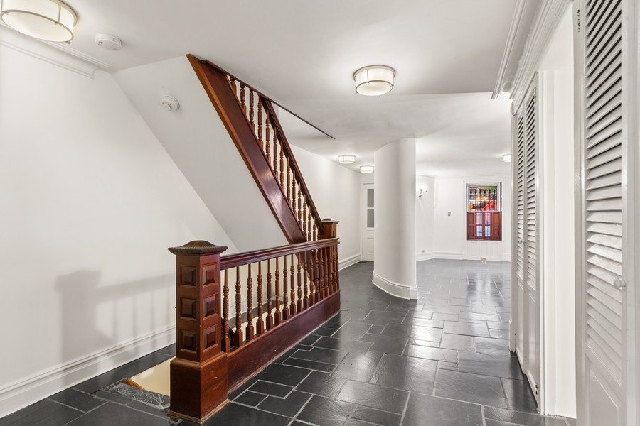 143 West 78th Street Manhattan, NY 10024 - Photo 7 of 17 a view of staircase with railing and white walls