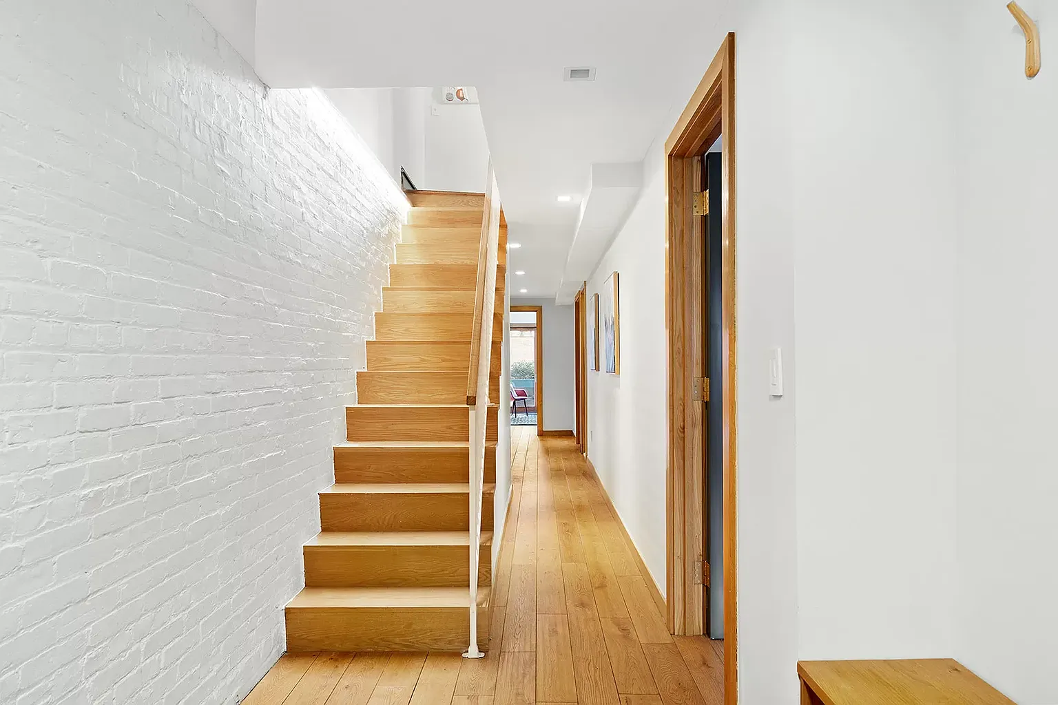 252 Stuyvesant Avenue Brooklyn, NY 11221 - Photo 10 of 26 a view of entryway with wooden floor