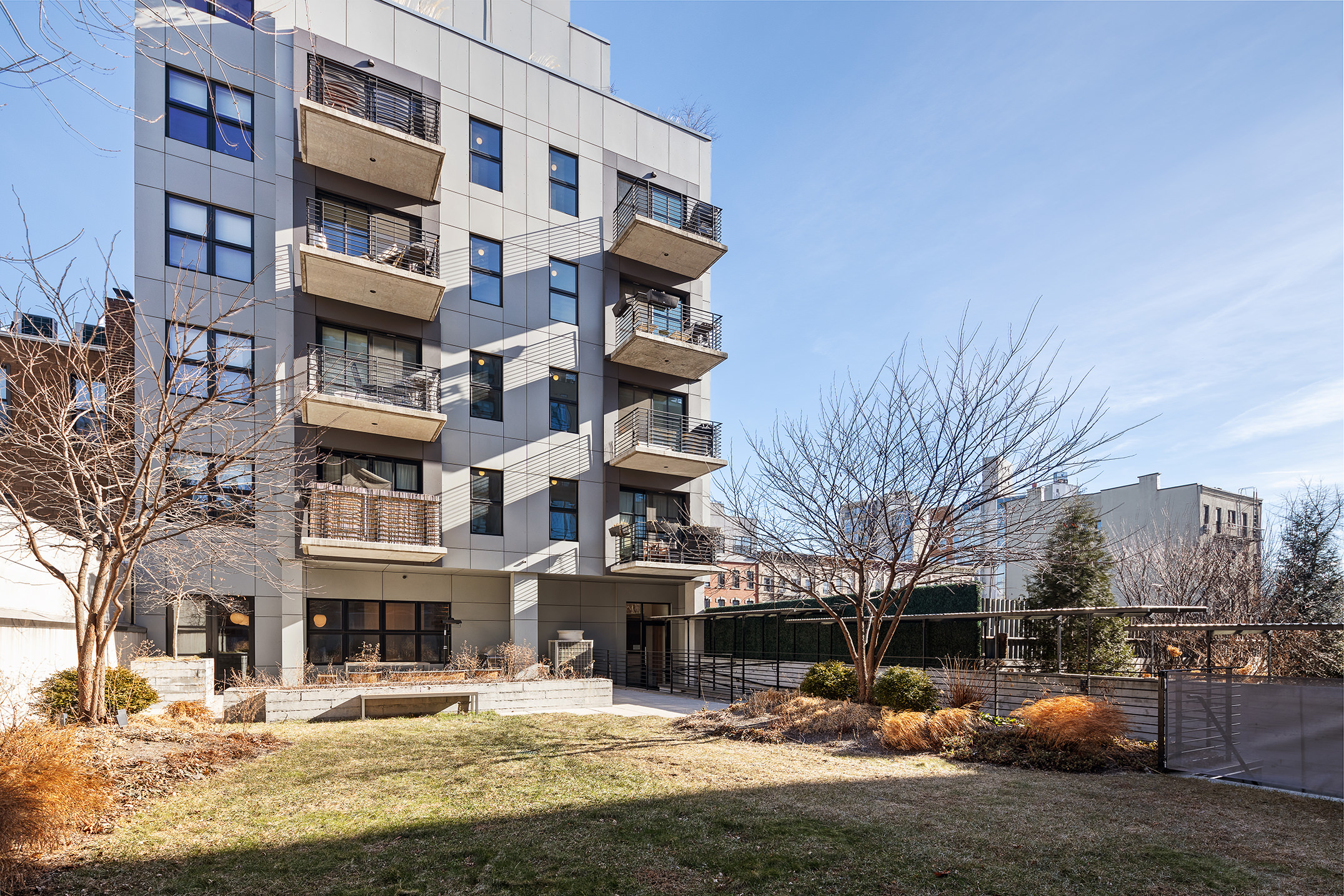 868 Lorimer Street, Unit 4C Brooklyn, NY 11222 - Photo 12 of 14 a front view of a building with street view