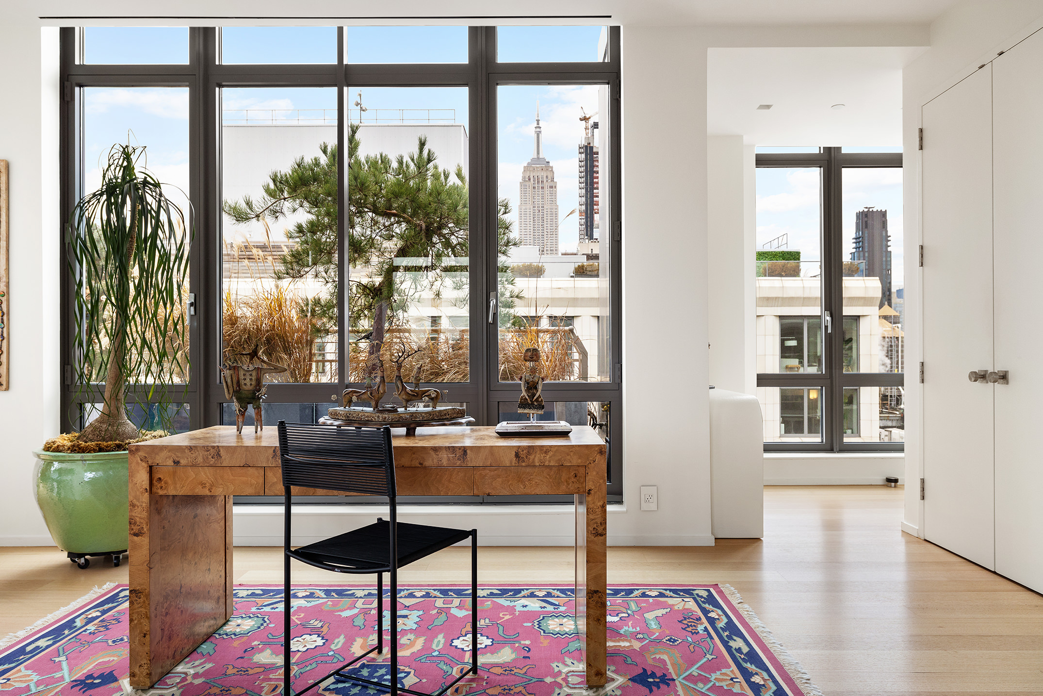 4 West 21st Street, Unit PH Manhattan, NY 10010 - Photo 5 of 14 a living room with furniture and a window
