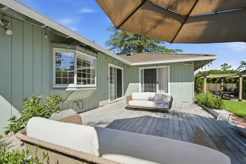 a outdoor living space with furniture and garden