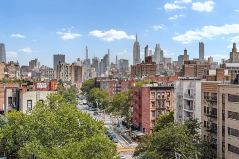 a view of a city with tall buildings