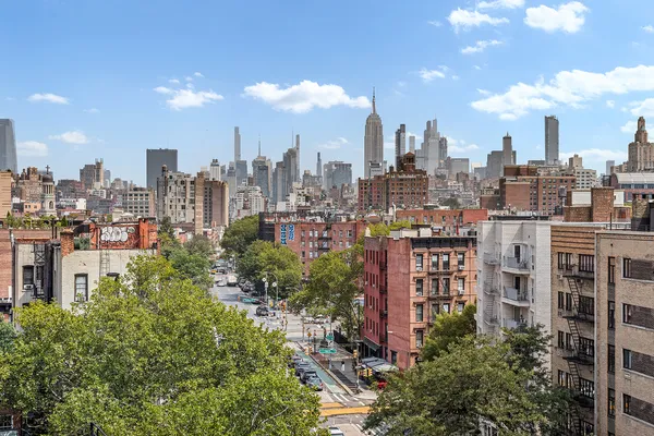 a view of a city with tall buildings