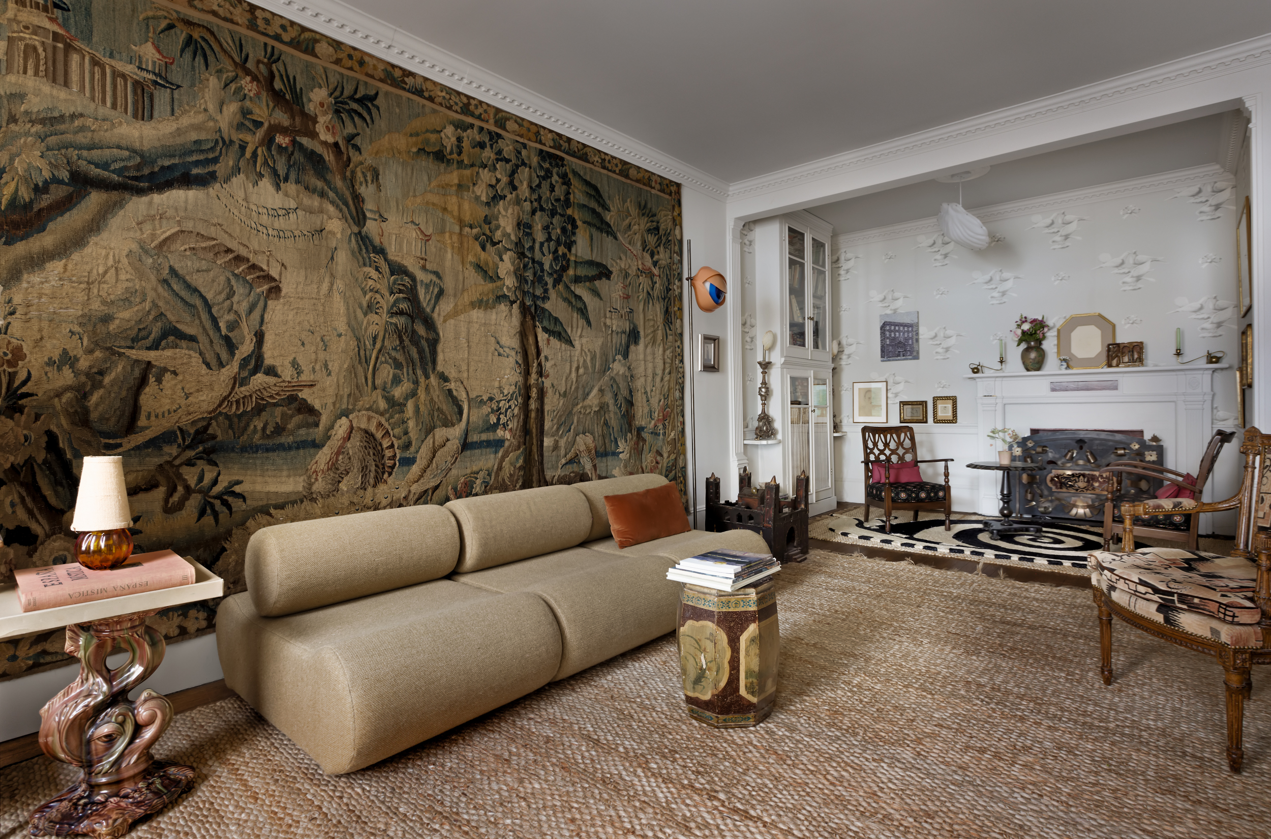 212 East 48th Street, Unit 8E Manhattan, NY 10017 - Photo 2 of 14 a living room with furniture and a couch