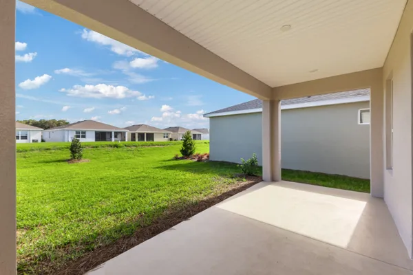 a view of a back yard of the house