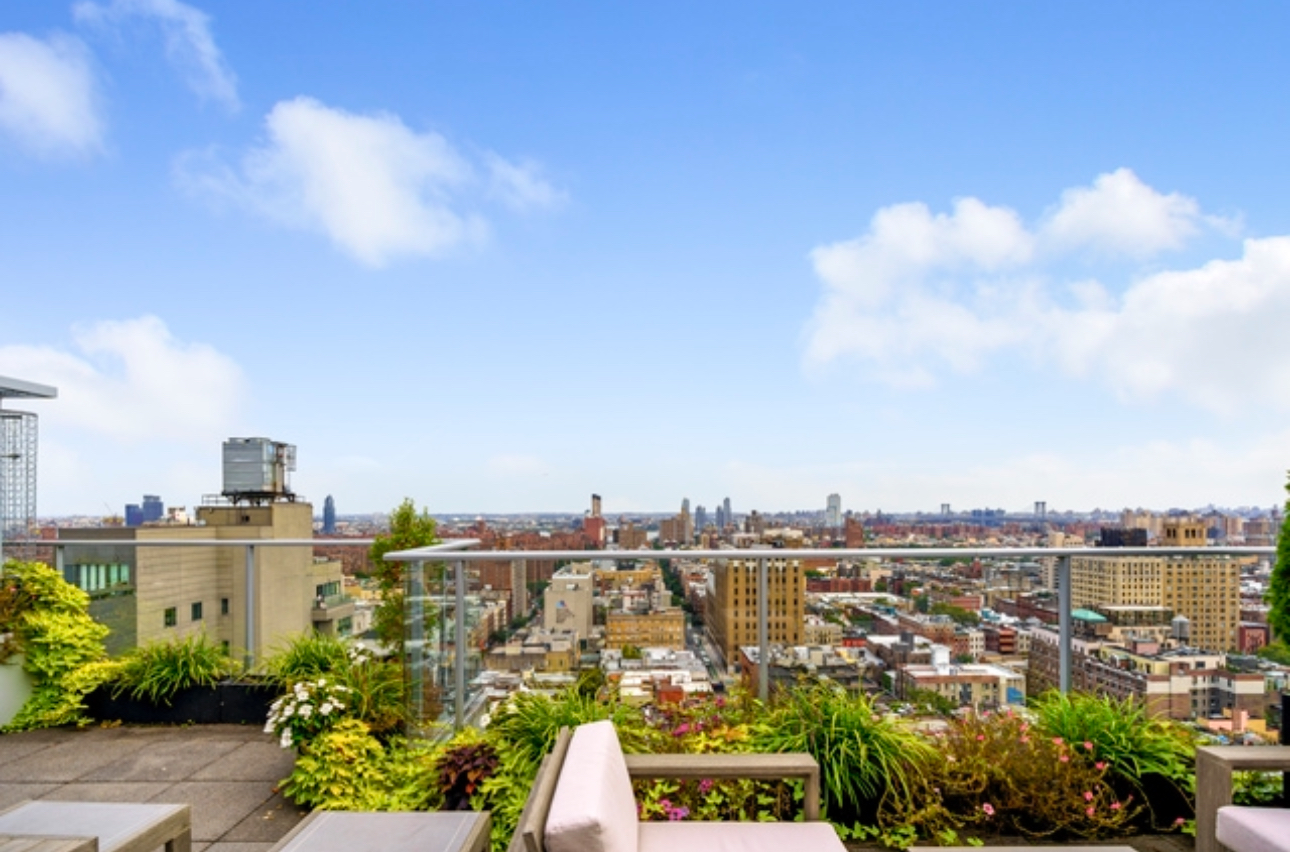 110 3rd Avenue, Unit 9B Manhattan, NY 10003 - Photo 10 of 14 a view of a city with tall buildings