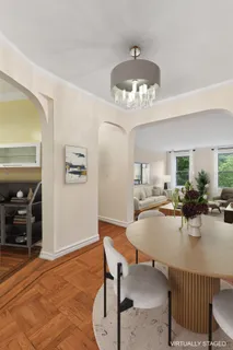 a view of a dining room with furniture