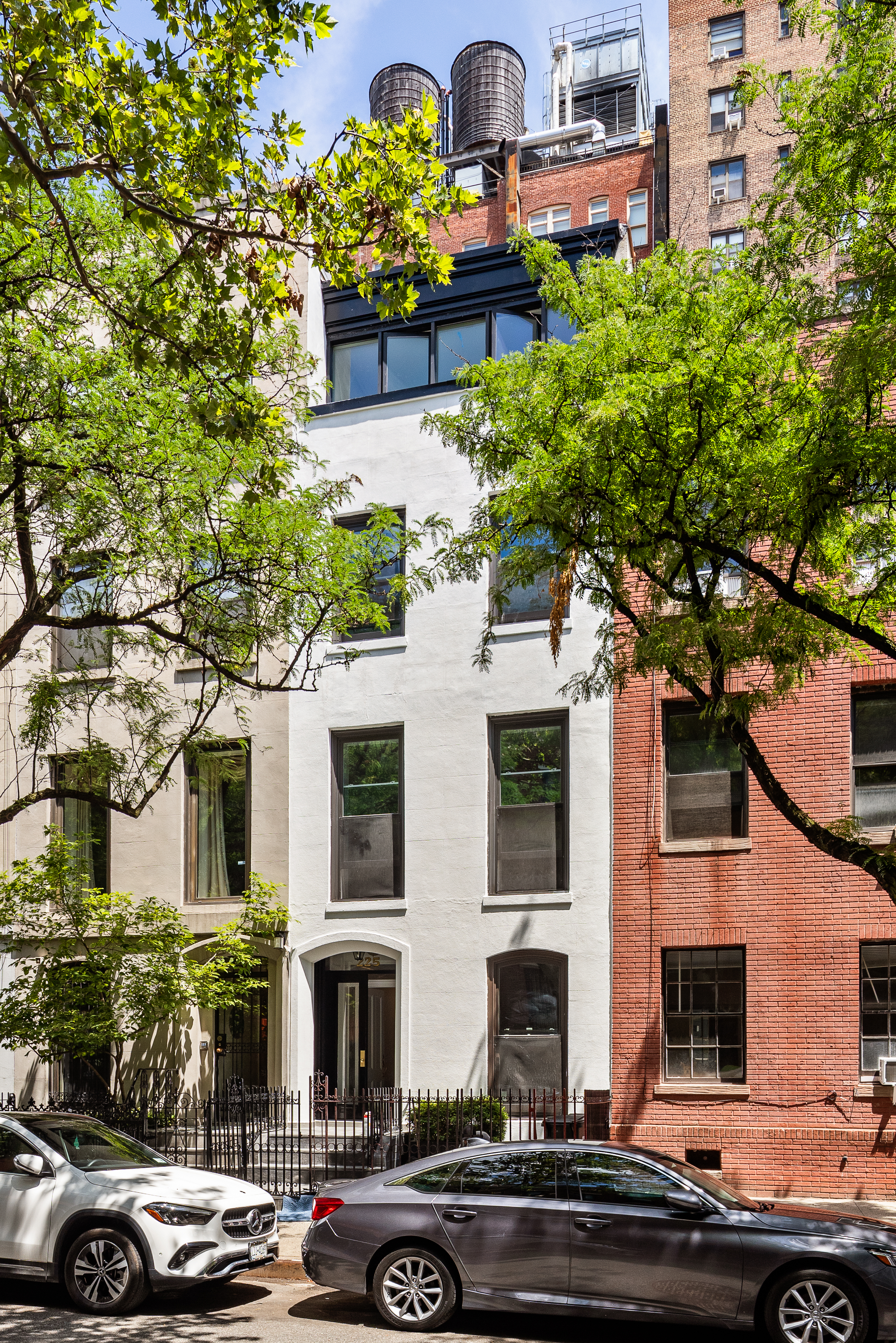 a front view of a building with street view