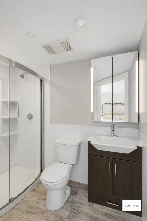 a picture of a bench in front of a window