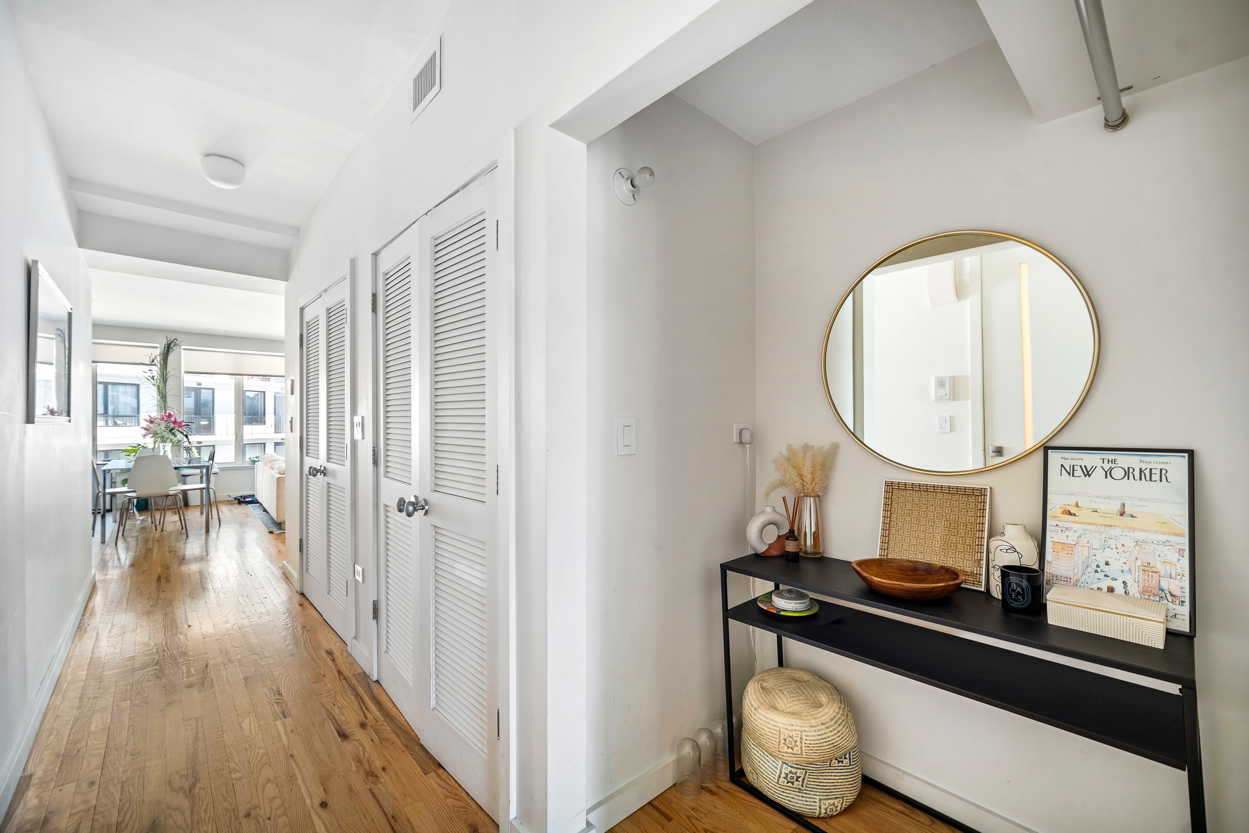 65 Jackson Street Brooklyn, NY 11211 - Photo 29 of 36 a living room with a bed furniture and a large window