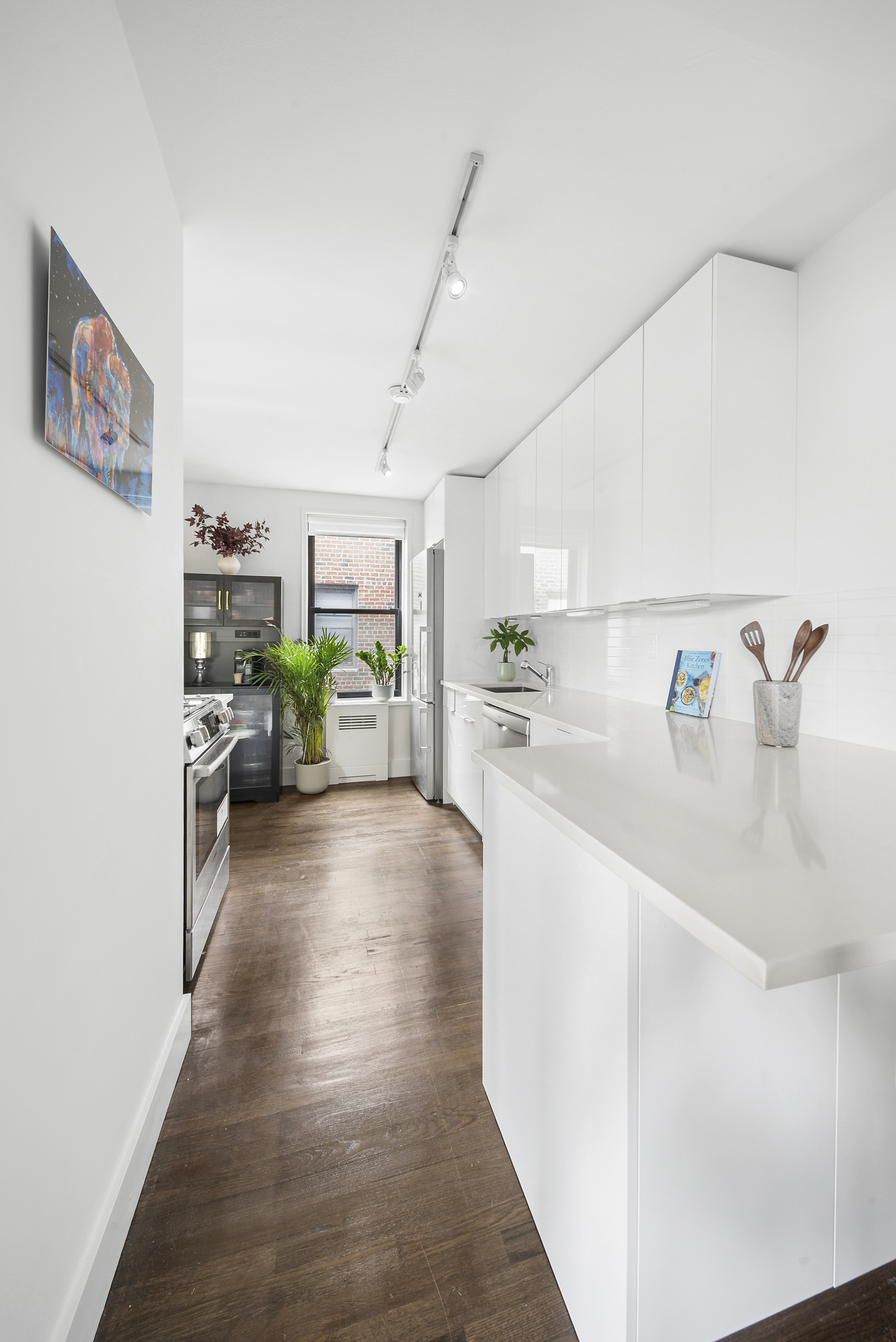 9511 Shore Road, Unit 505 Brooklyn, NY 11209 - Photo 7 of 18 a view of a kitchen and utility room