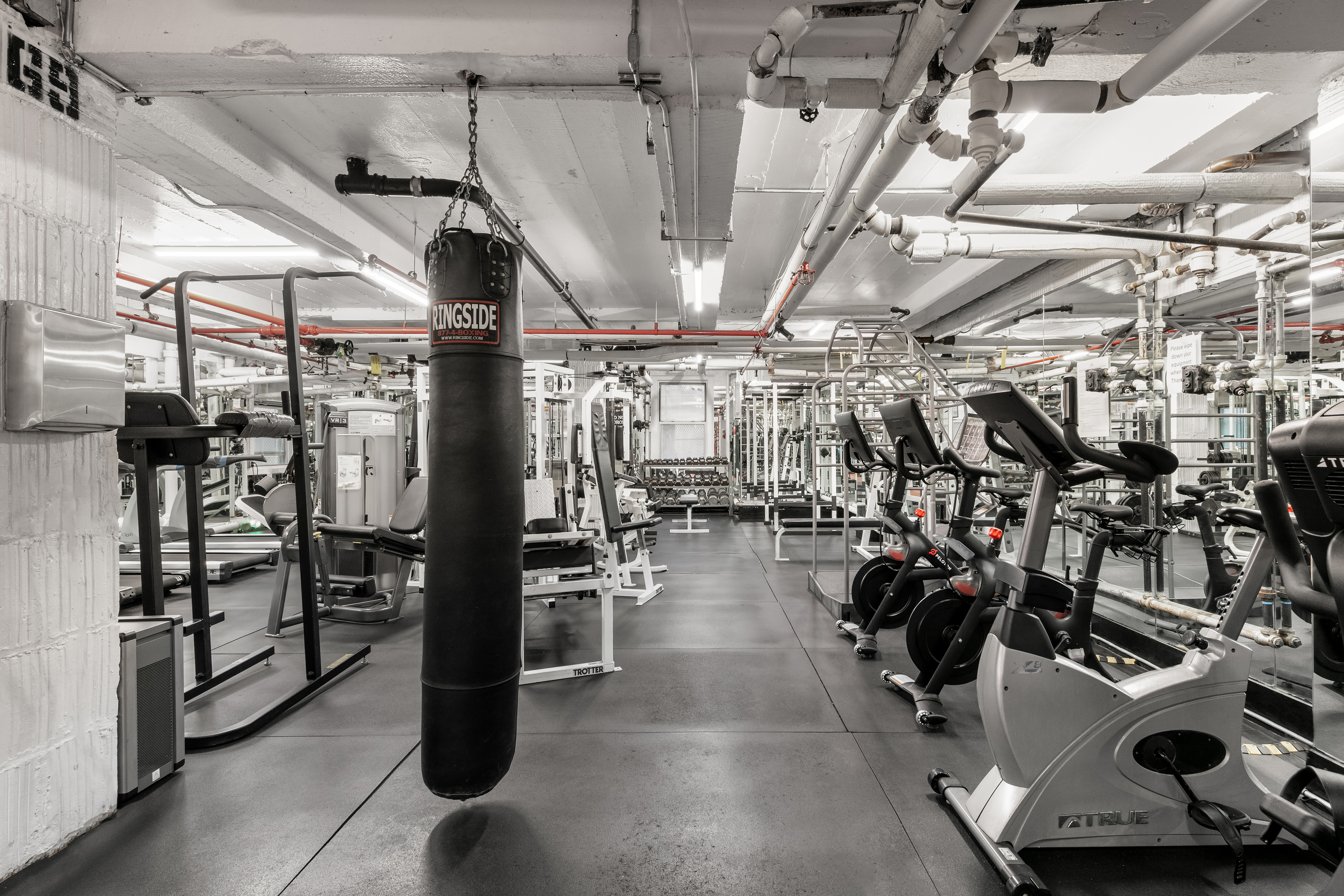 333 East 43rd Street, Unit 110/111 Manhattan, NY 10017 - Photo 9 of 16 a view of a room with gym equipment