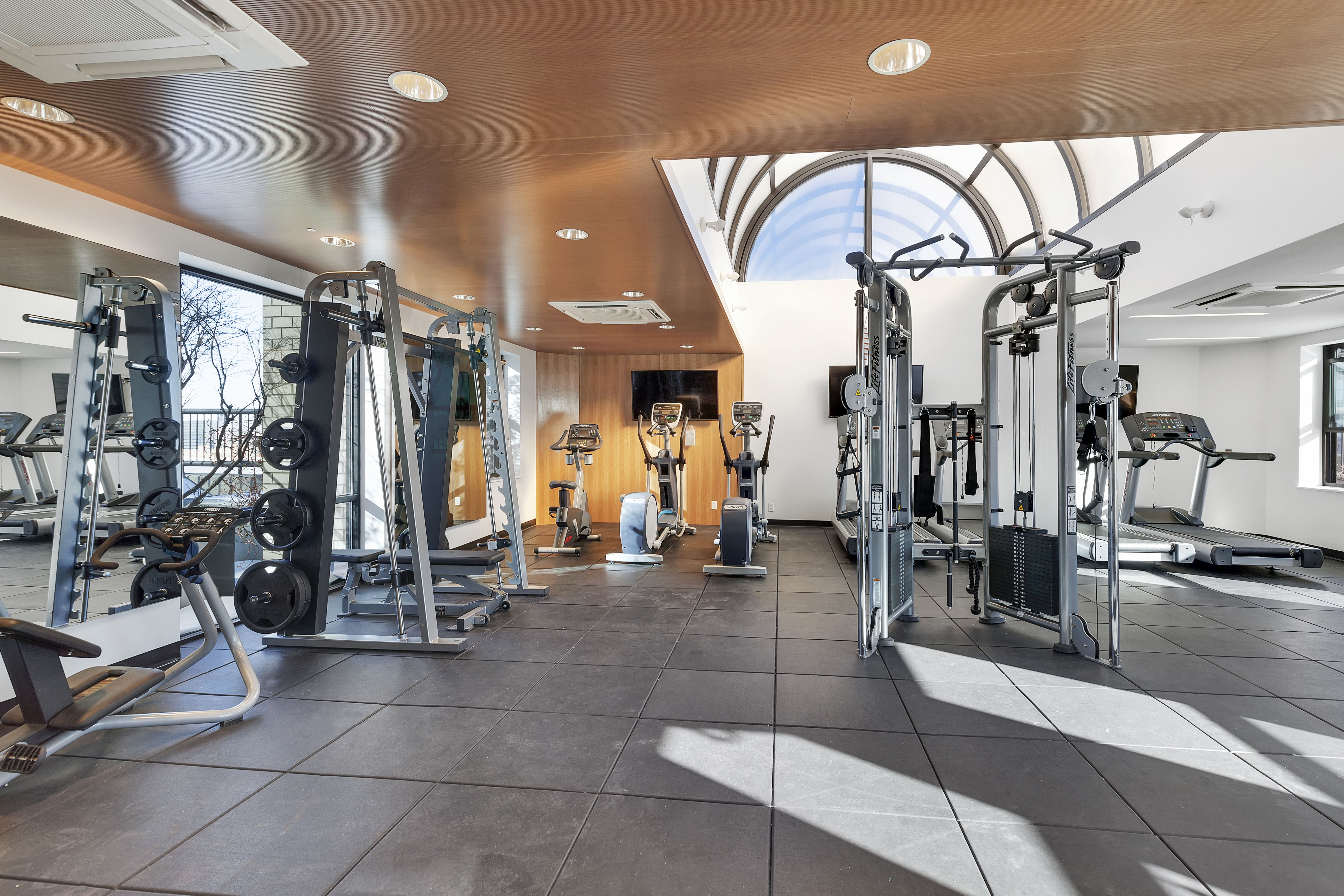 280 Park Avenue South, Unit 26M Manhattan, NY 10010 - Photo 8 of 14 a view of a room with gym equipment
