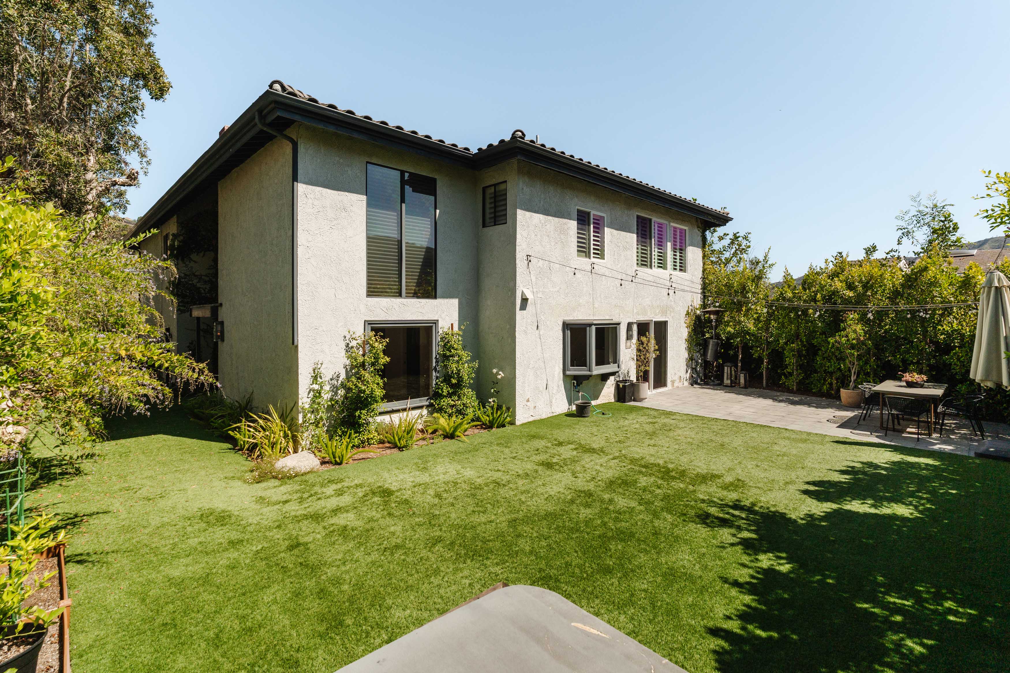 17273 Avenida De La Herradura Pacific Palisades, CA 90272 - Photo 11 of 23 a view of a house with a yard