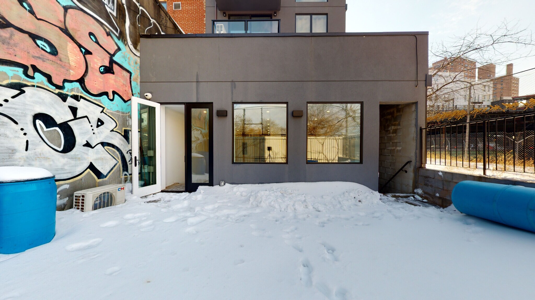 319 Broadway Brooklyn, NY 11211 - Photo 13 of 22 a view of a house with large windows