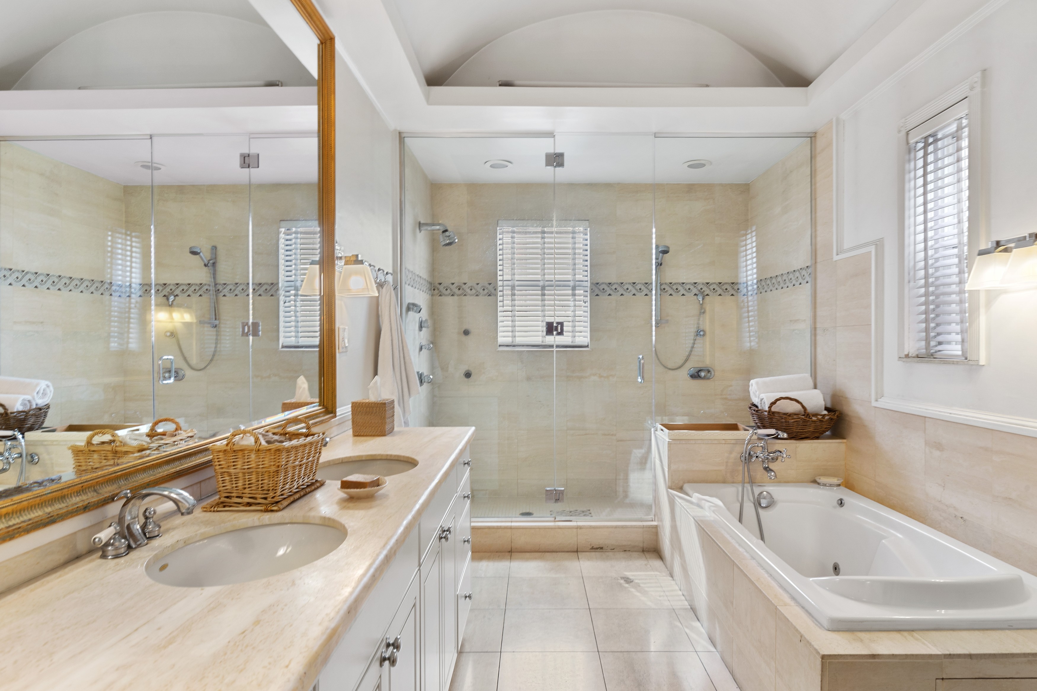 333 West 71st Street Manhattan, NY 10023 - Photo 11 of 29 a bathroom with a tub sink and mirror