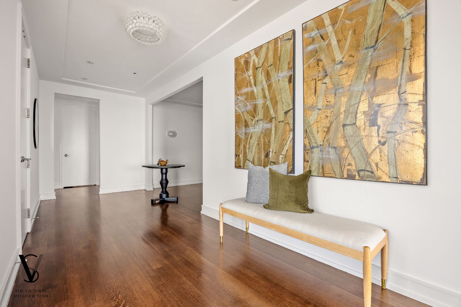 151 East 58th Street, Unit 32C Manhattan, NY 10022 - Photo 17 of 24 a living room with furniture and wooden floor