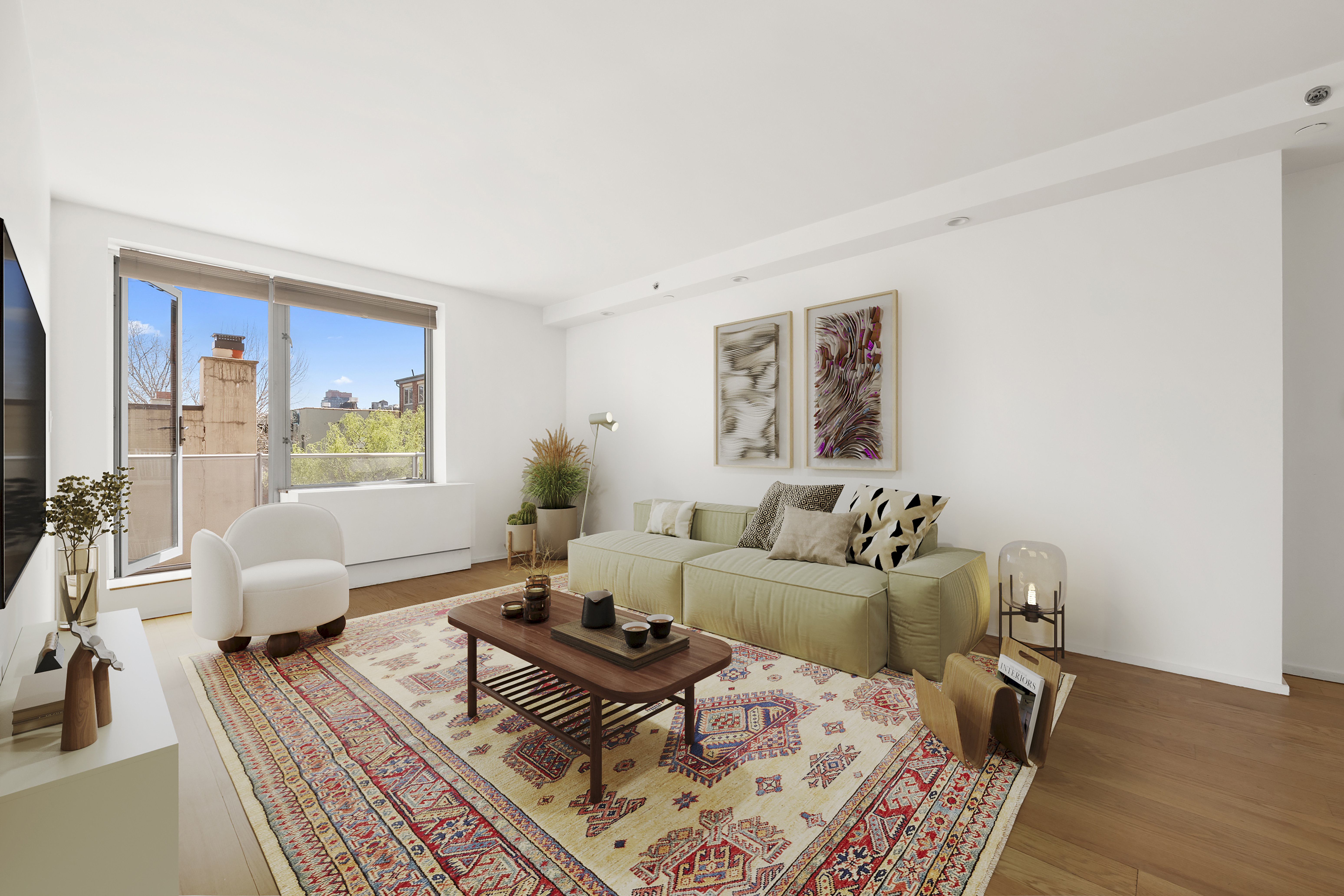 2280 Frederick Douglass Boulevard, Unit 6A Manhattan, NY 10027 - Photo 1 of 13 a living room with furniture rug and wooden floor