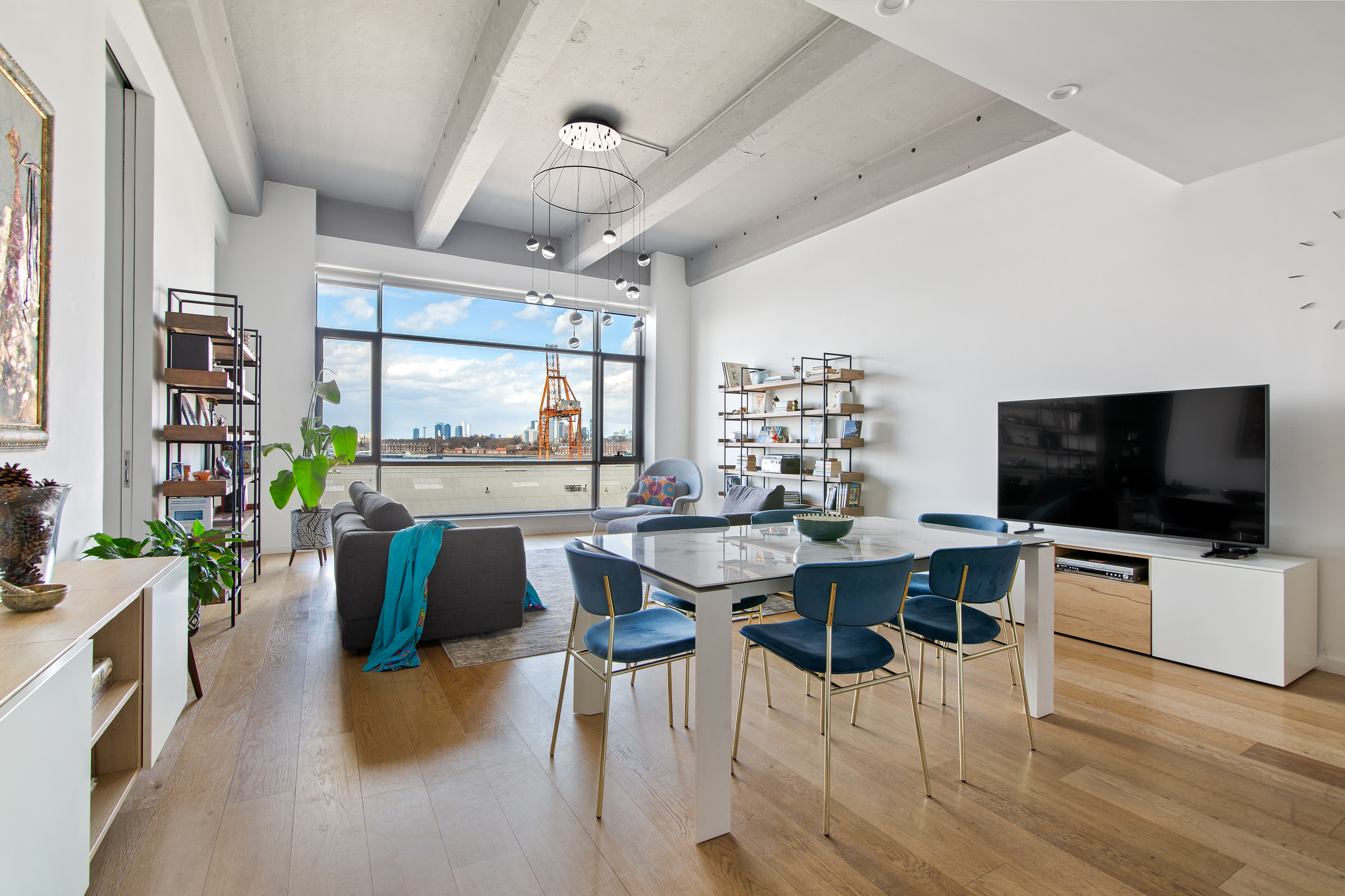 160 Imlay Street, Unit 4E2 Brooklyn, NY 11231 - Photo 5 of 8 a view of a dining room with furniture window and wooden floor