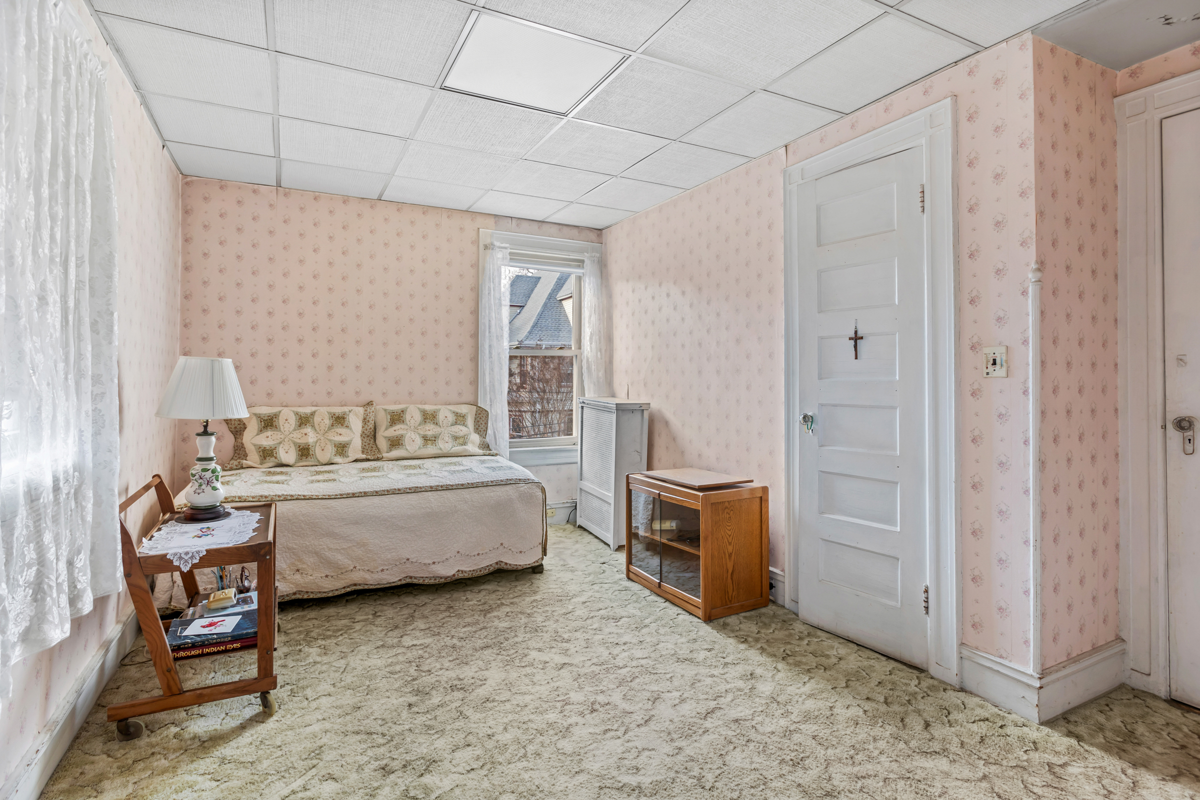 686 Rugby Road Brooklyn, NY 11230 - Photo 8 of 18 a spacious bedroom with a bed and a view of bathroom
