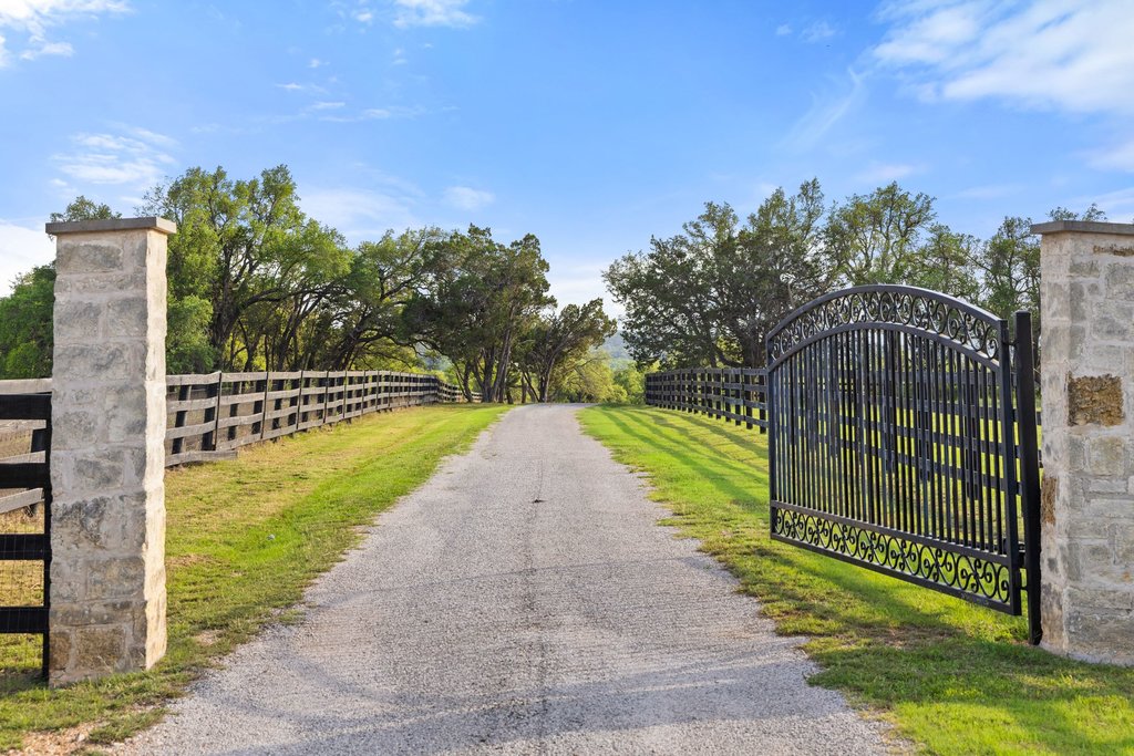 2560 Bell Springs Road Dripping Springs, TX 78620 - Photo 3 of 42 a view of a park with iron fence