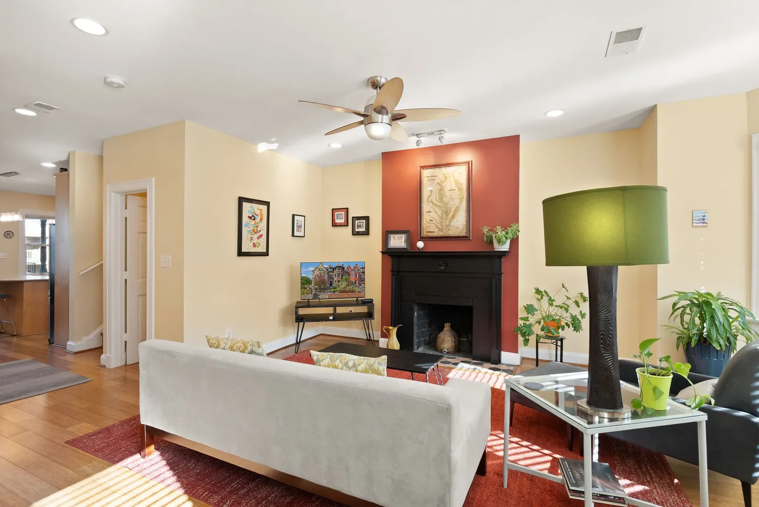 a living room with furniture and a flat screen tv