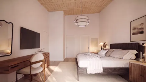 a bedroom with a bed and window