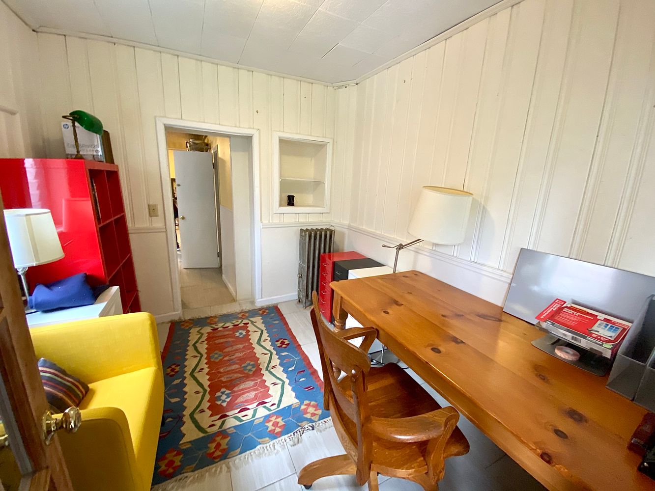 390 5th Street, Unit 1 Brooklyn, NY 11215 - Photo 14 of 15 a bed room with a bed and a lamp