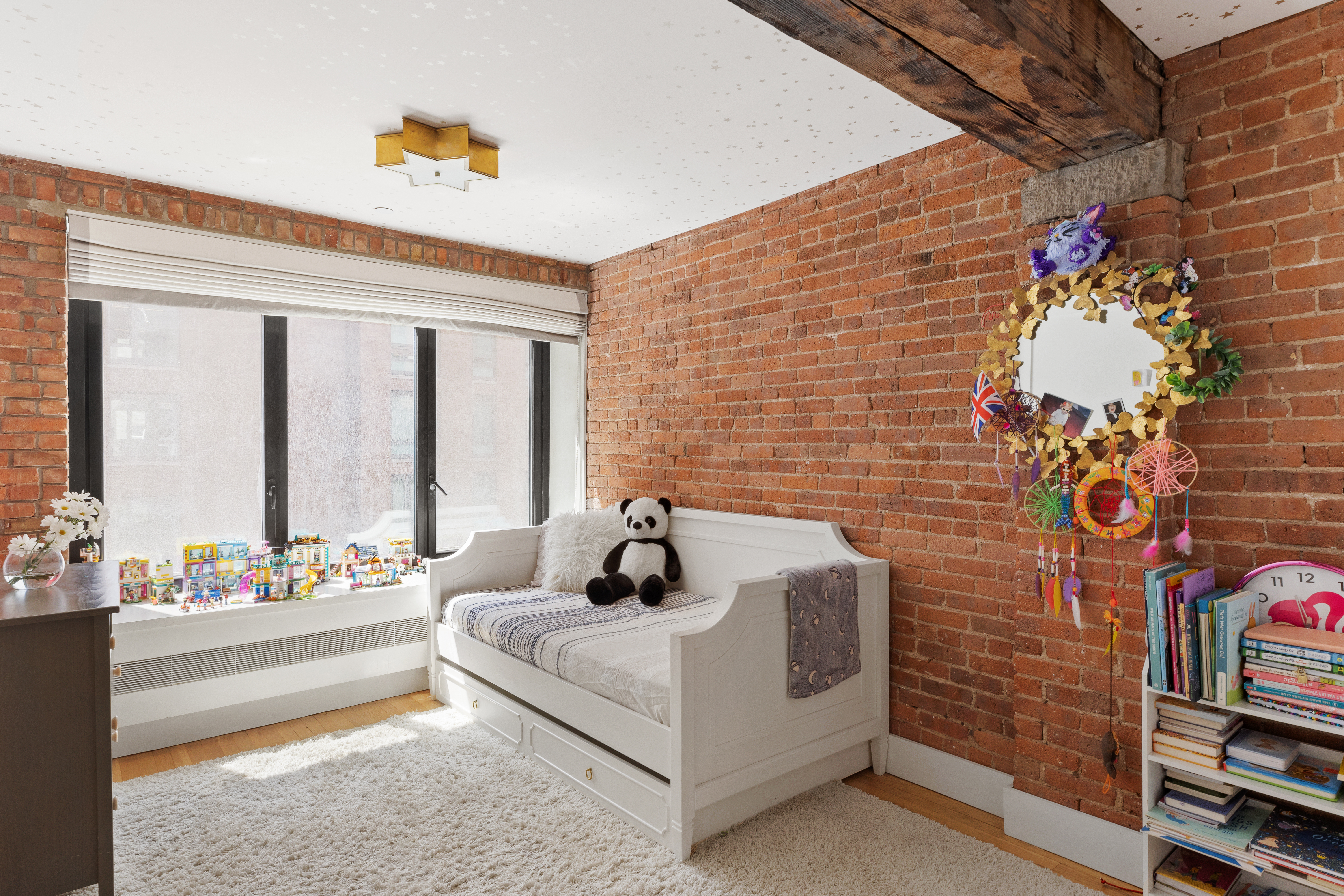 466 Washington Street, Unit 3W Manhattan, NY 10013 - Photo 10 of 14 a bedroom with furniture and a potted plant