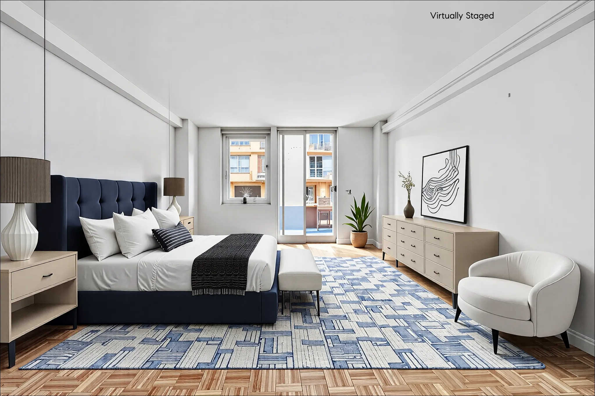 350 West 50th Street, Unit 2DD Manhattan, NY 10019 - Photo 2 of 7 a bedroom with a large bed and a couch
