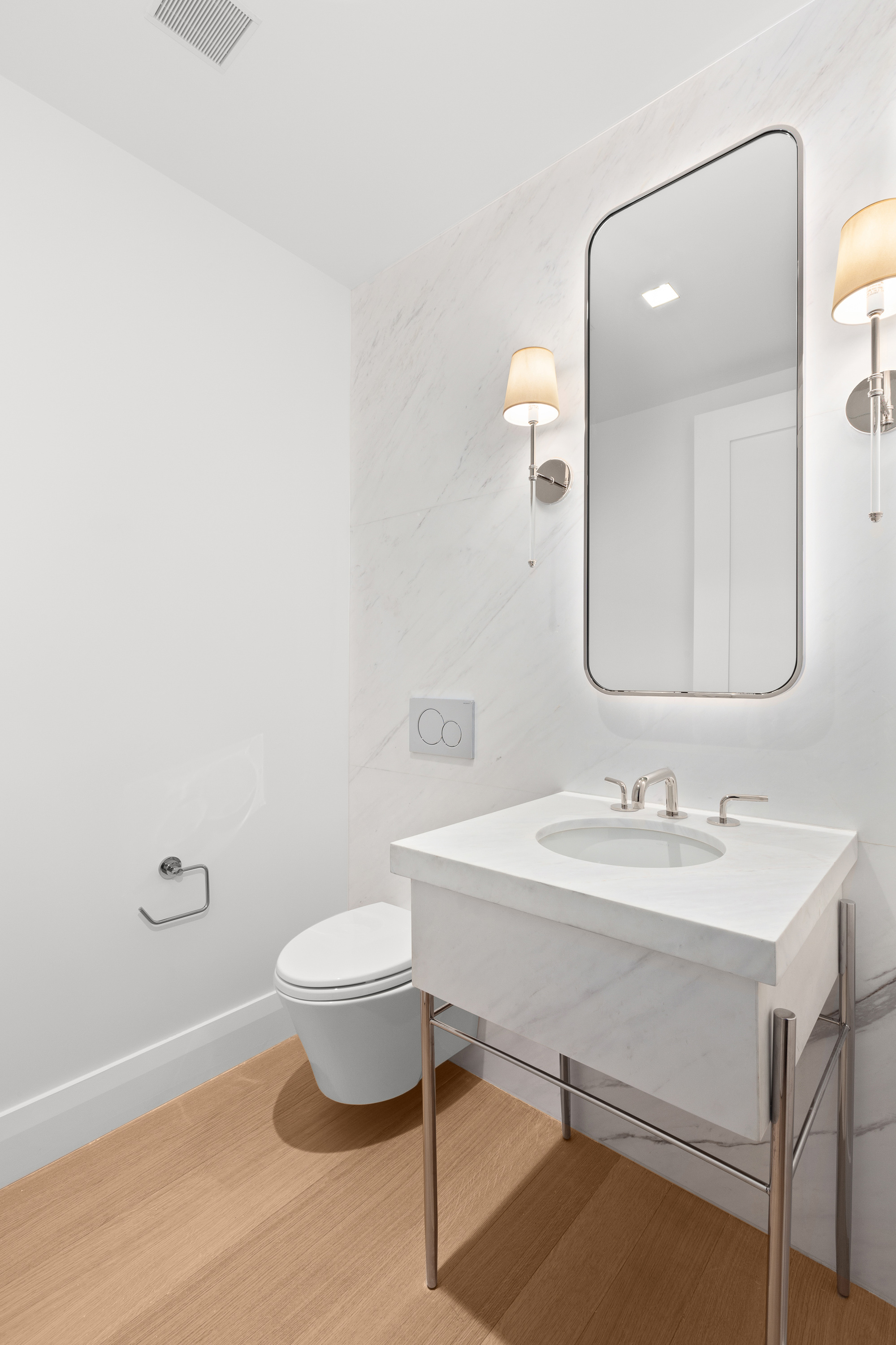 200 East 83rd Street, Unit 5D Manhattan, NY 10028 - Photo 9 of 29 a bathroom with a sink and a mirror