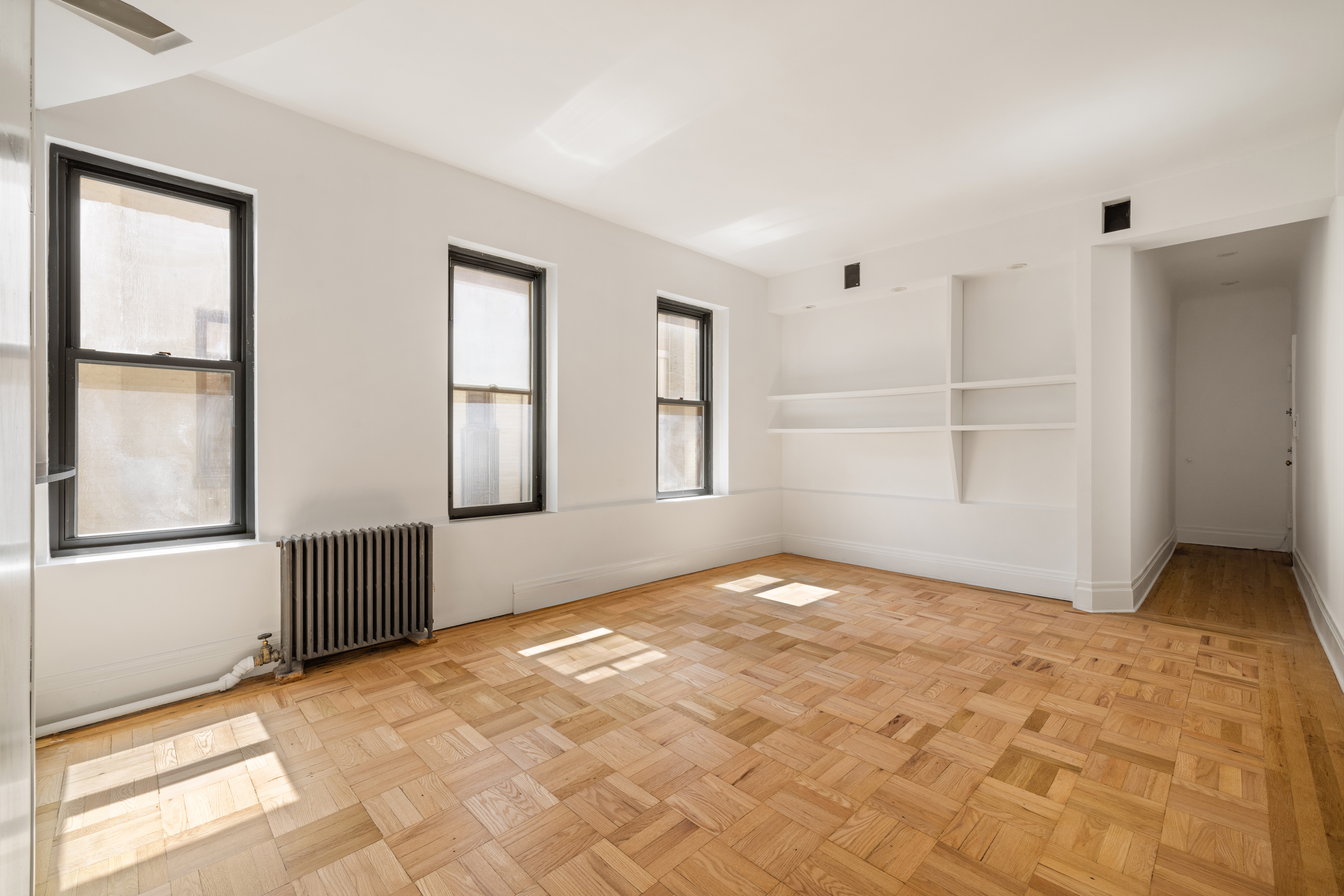 327 West 83rd Street, Unit 6B Manhattan, NY 10024 - Photo 4 of 13 a view of an empty room with a window