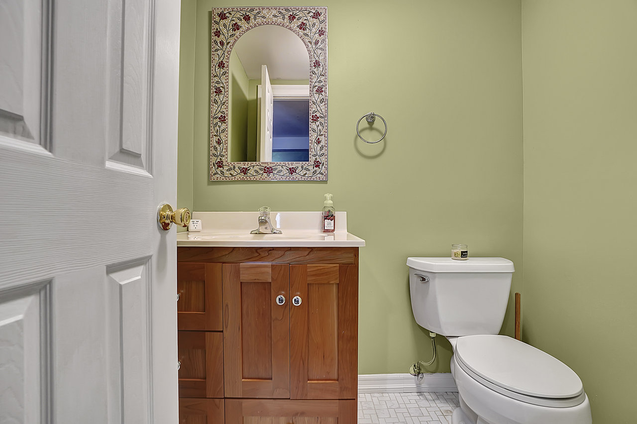 266 Feronia Way Rutherford, NJ 07070 - Photo 16 of 41 a bathroom with a toilet mirror vanity and a sink