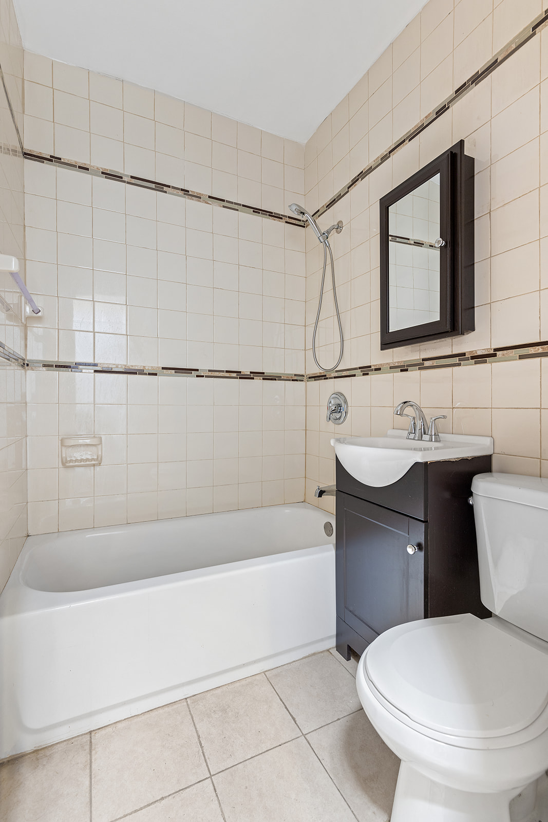 1599 A Pacific Street Brooklyn, NY 11213 - Photo 9 of 14 a bathroom with a sink toilet and shower