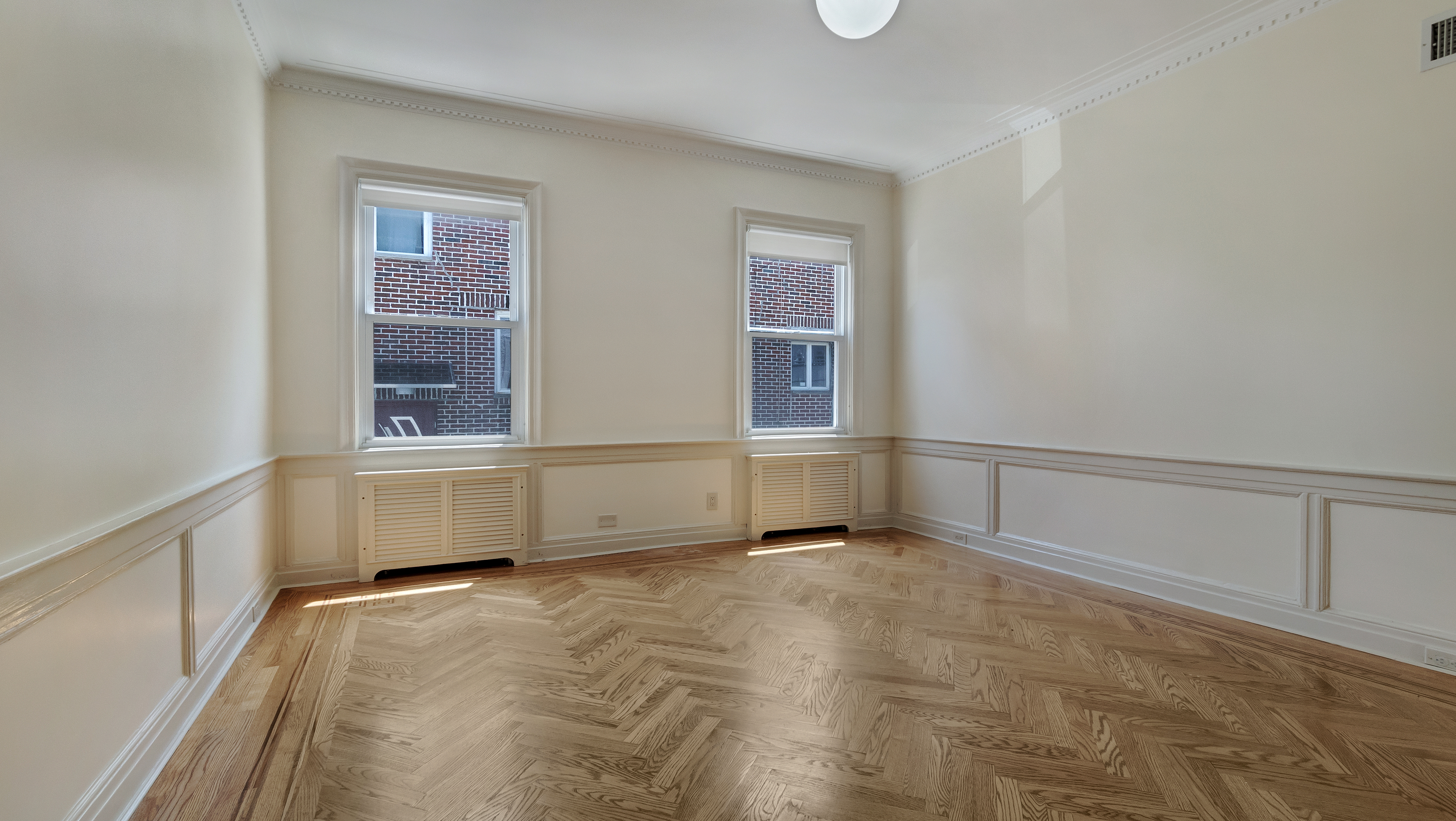 278 Amherst Street Brooklyn, NY 11235 - Photo 5 of 24 a view of an empty room with a window